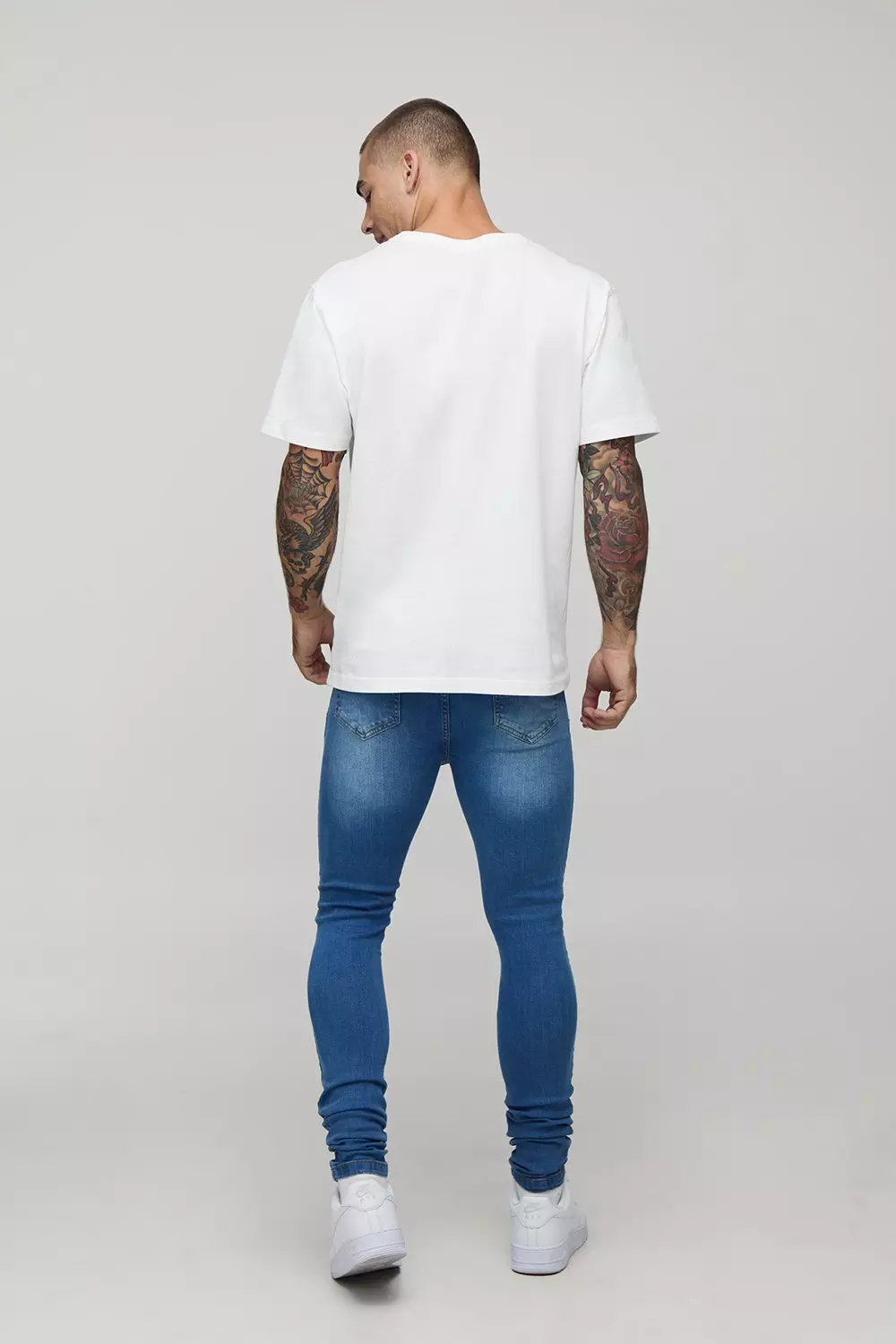 Super Skinny Stretch Jean In Light Blue | boohooMAN USA