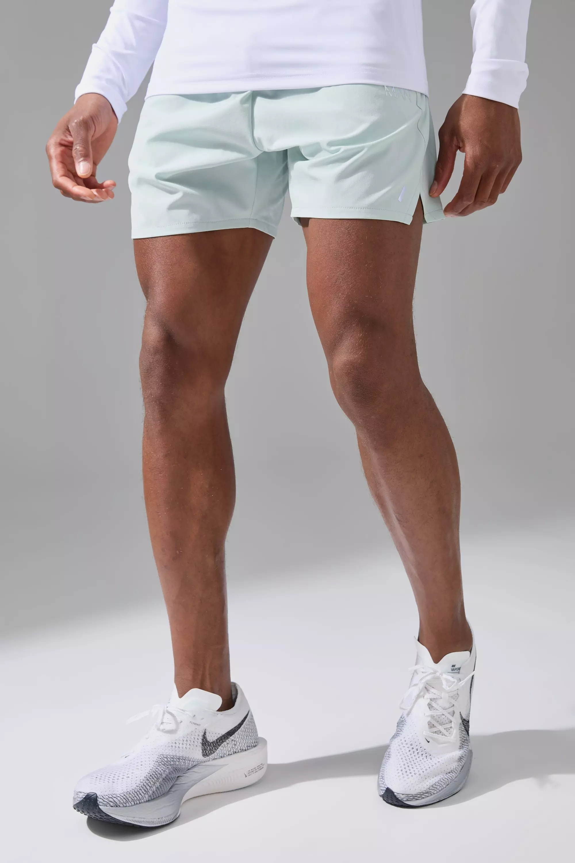 Man Active Perforated Stretch Woven Regular Fit 5inch Short Sage