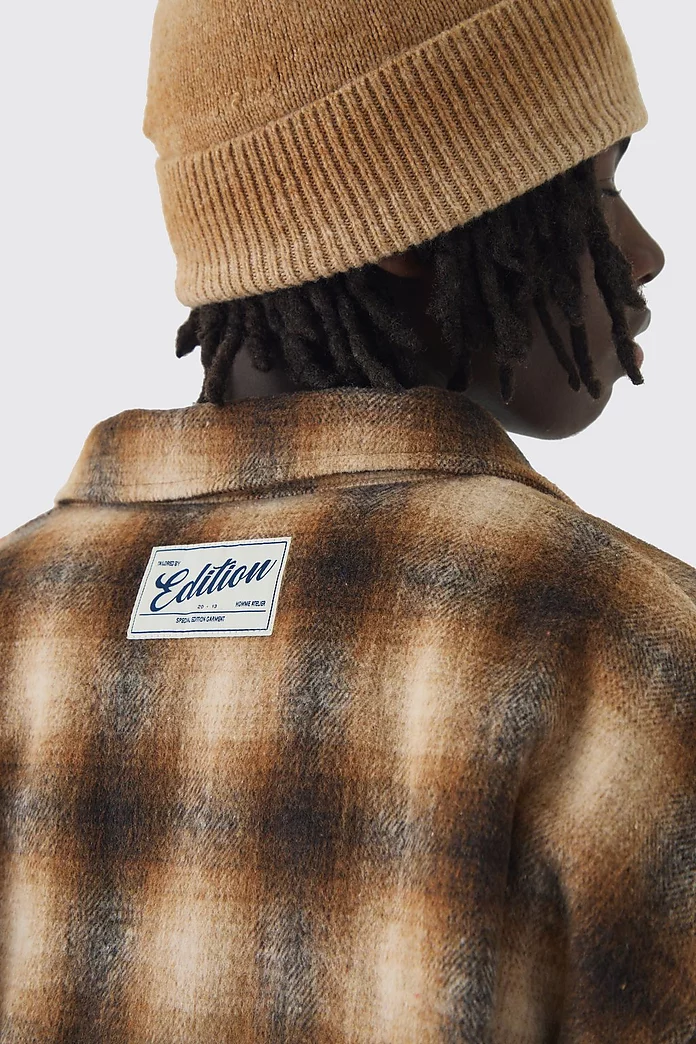 Oversized Padded Plaid Cargo Pocket Overshirt | boohooMAN USA Oversized Padded Plaid Cargo Pocket Overshirt | boohooMAN USA
