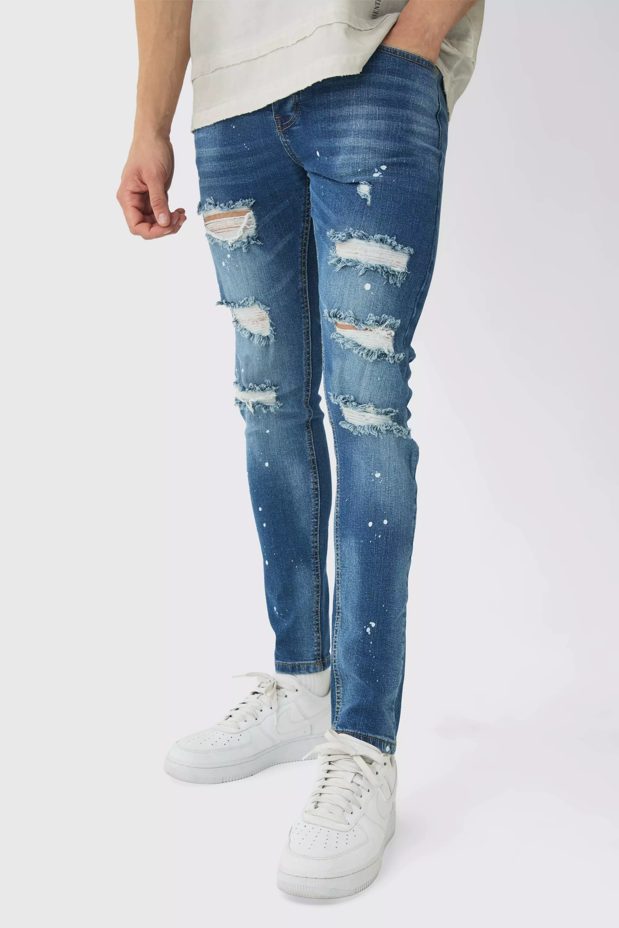 Blue Skinny Stretch Rip & Repair Paint Splatter Jeans