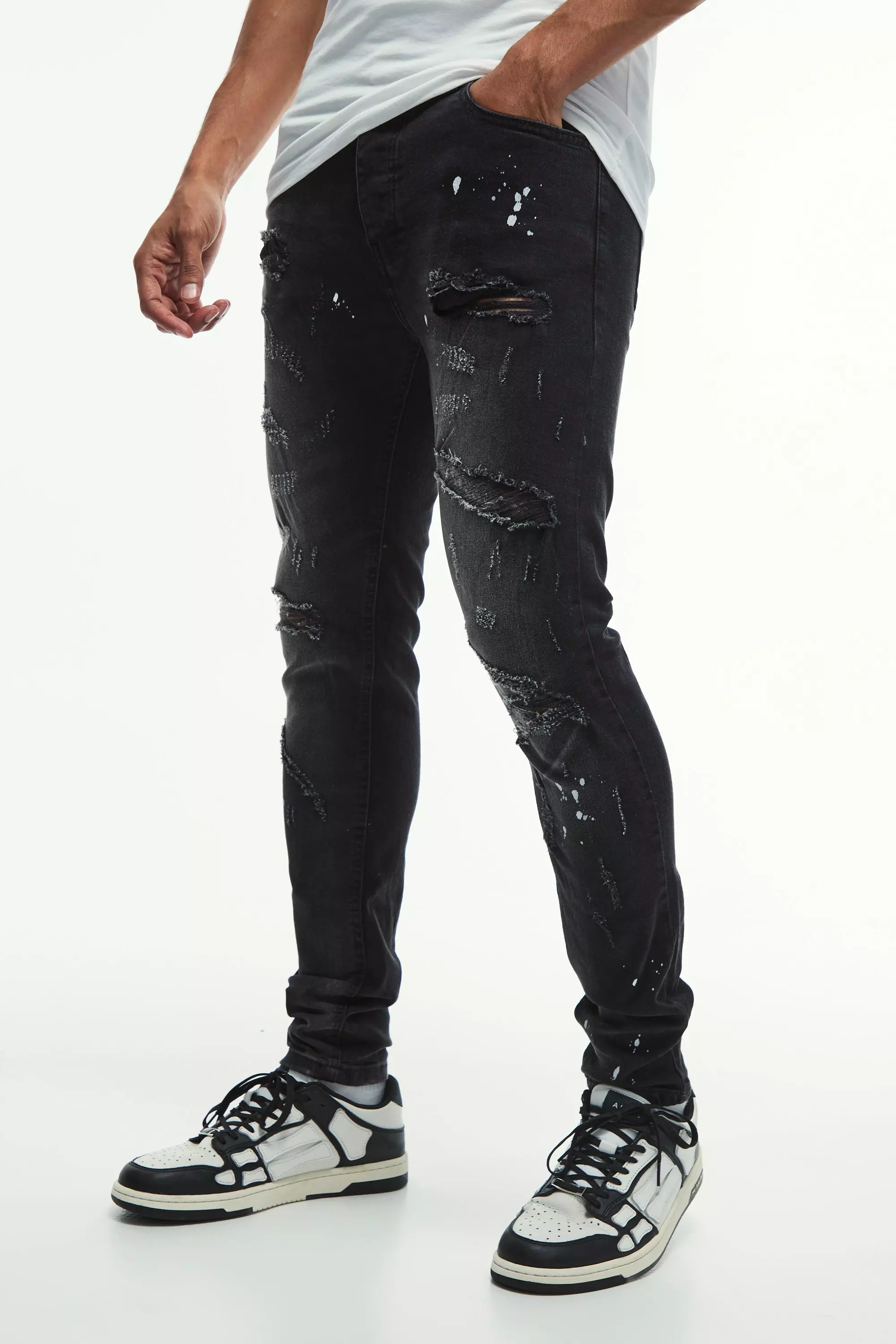 Skinny Stretch All Over Rip & Repair Paint Splatter Jeans | boohooMAN USA