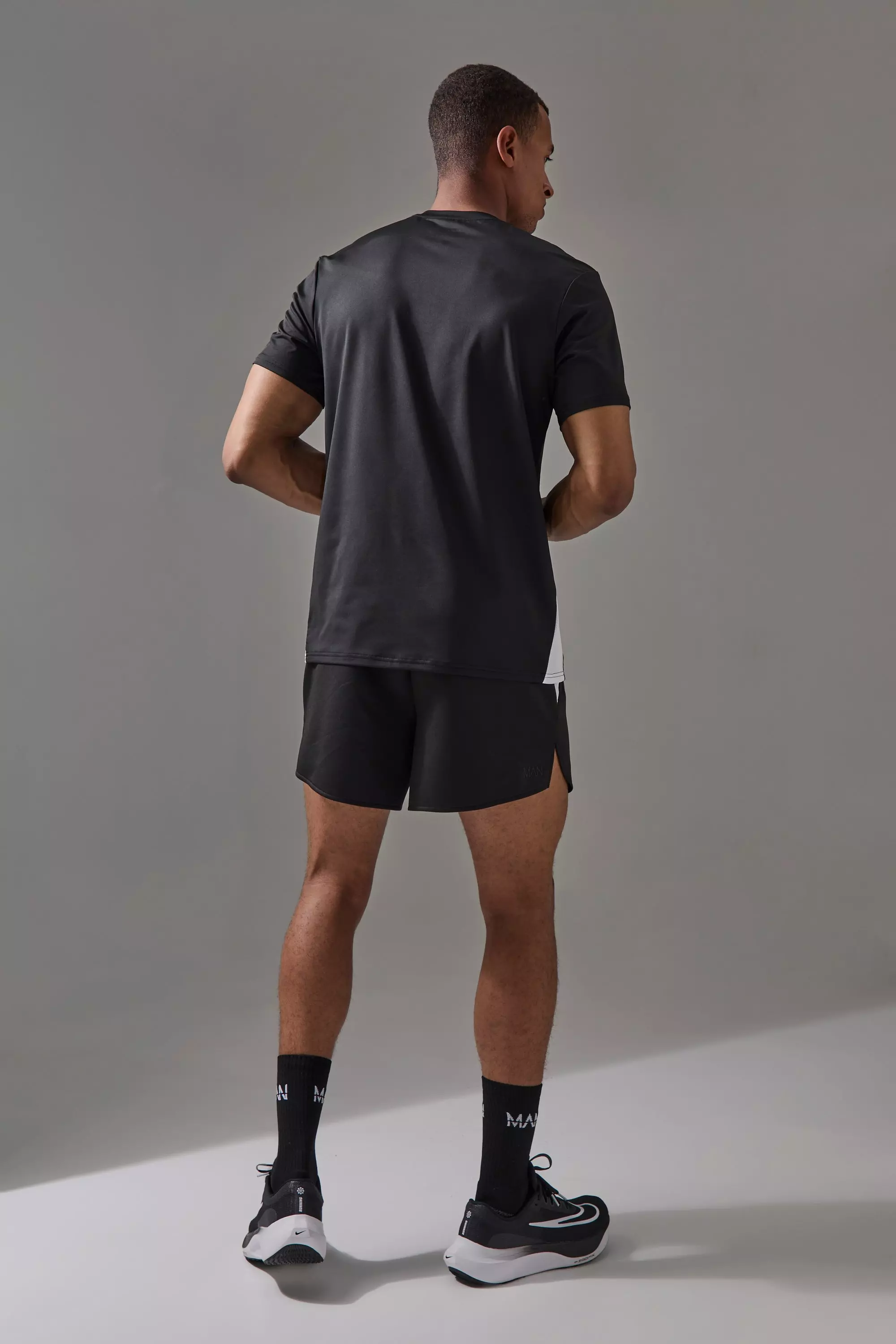 Man Active T-Shirt mit Ärmeln, Black alternatives Bild