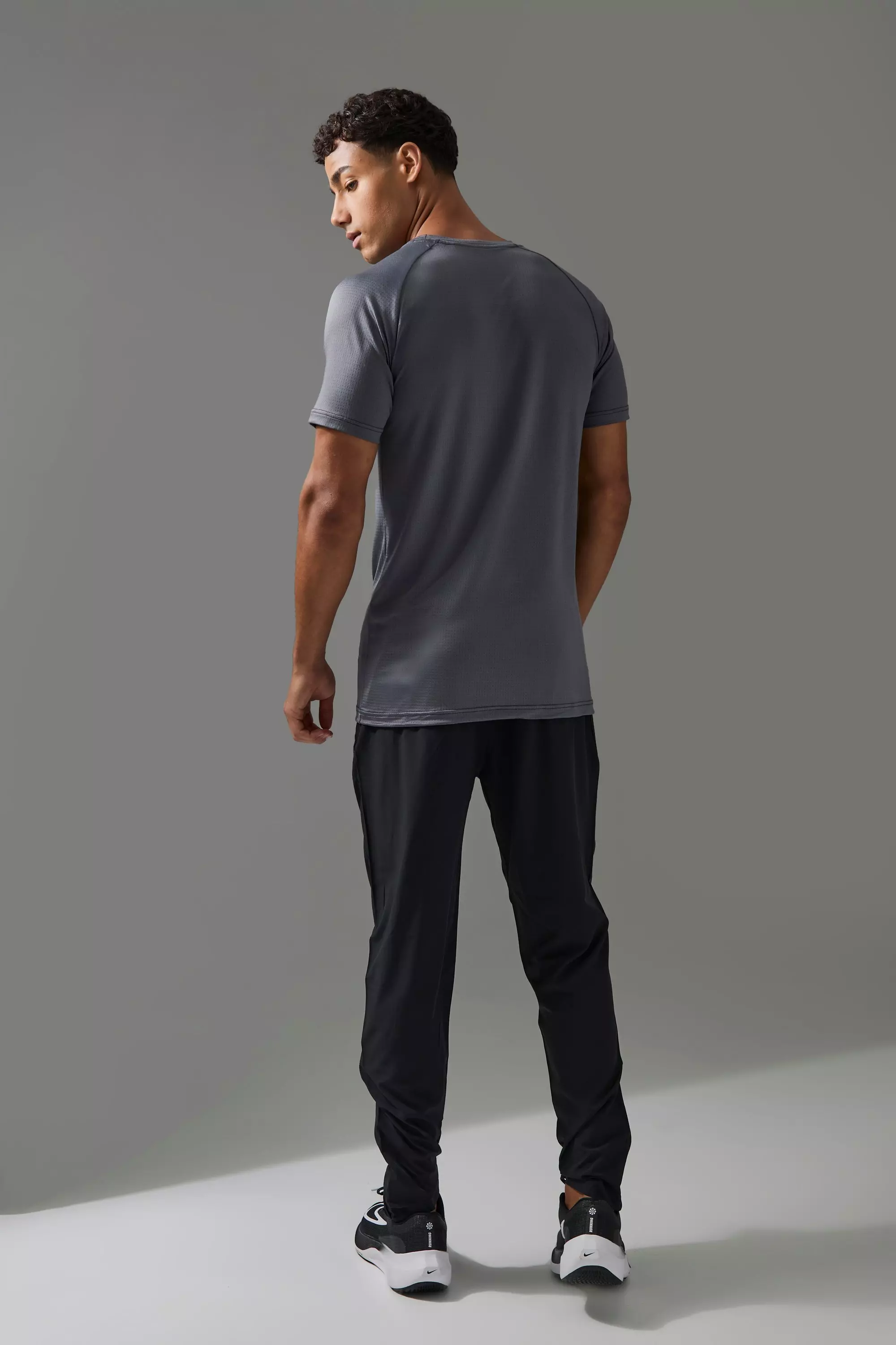 Man Active Performance Lightweight Stretch Woven Tapered Sweatpants | boohooMAN USA