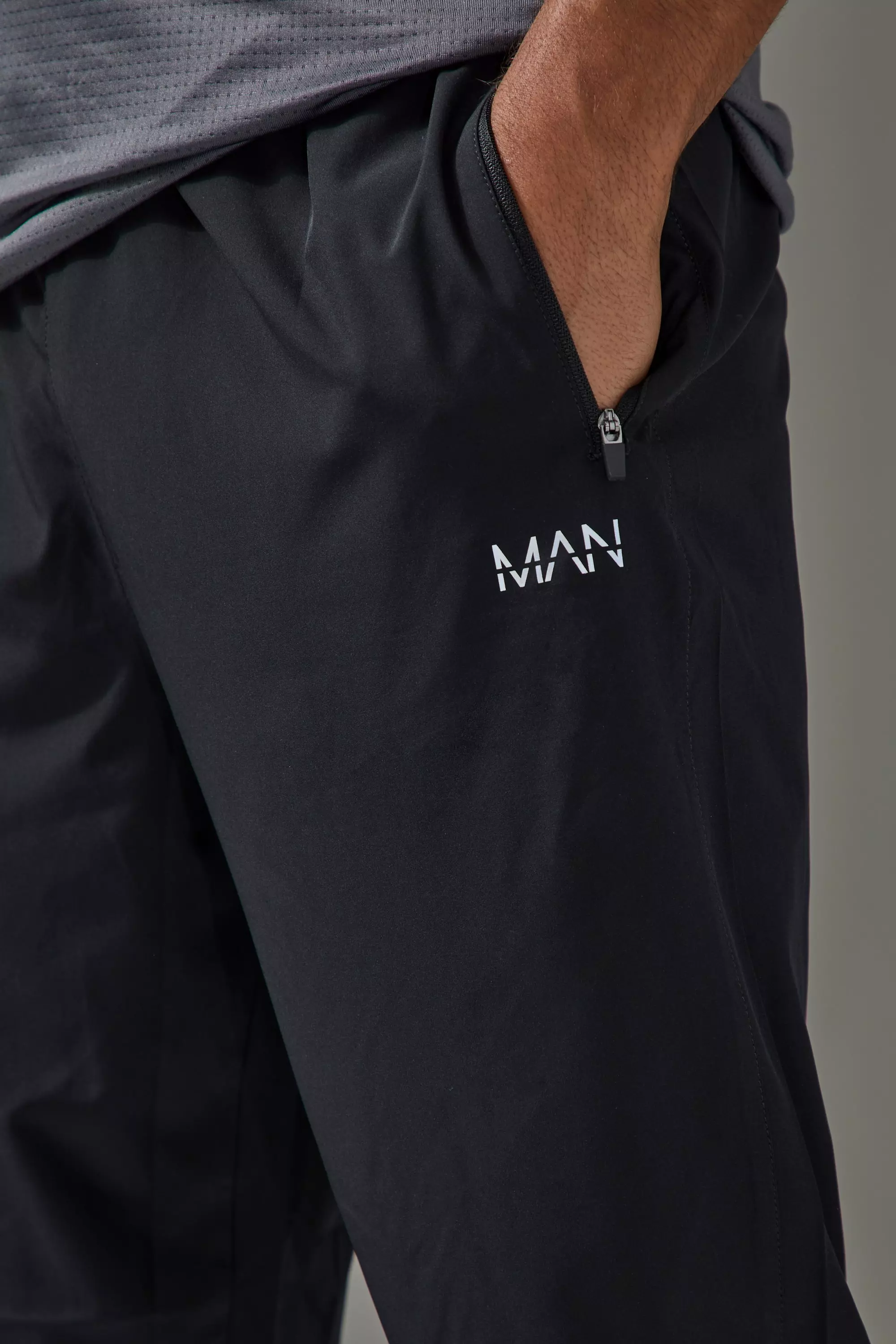 Man Active Performance Lightweight Stretch Woven Tapered Sweatpants | boohooMAN USA
