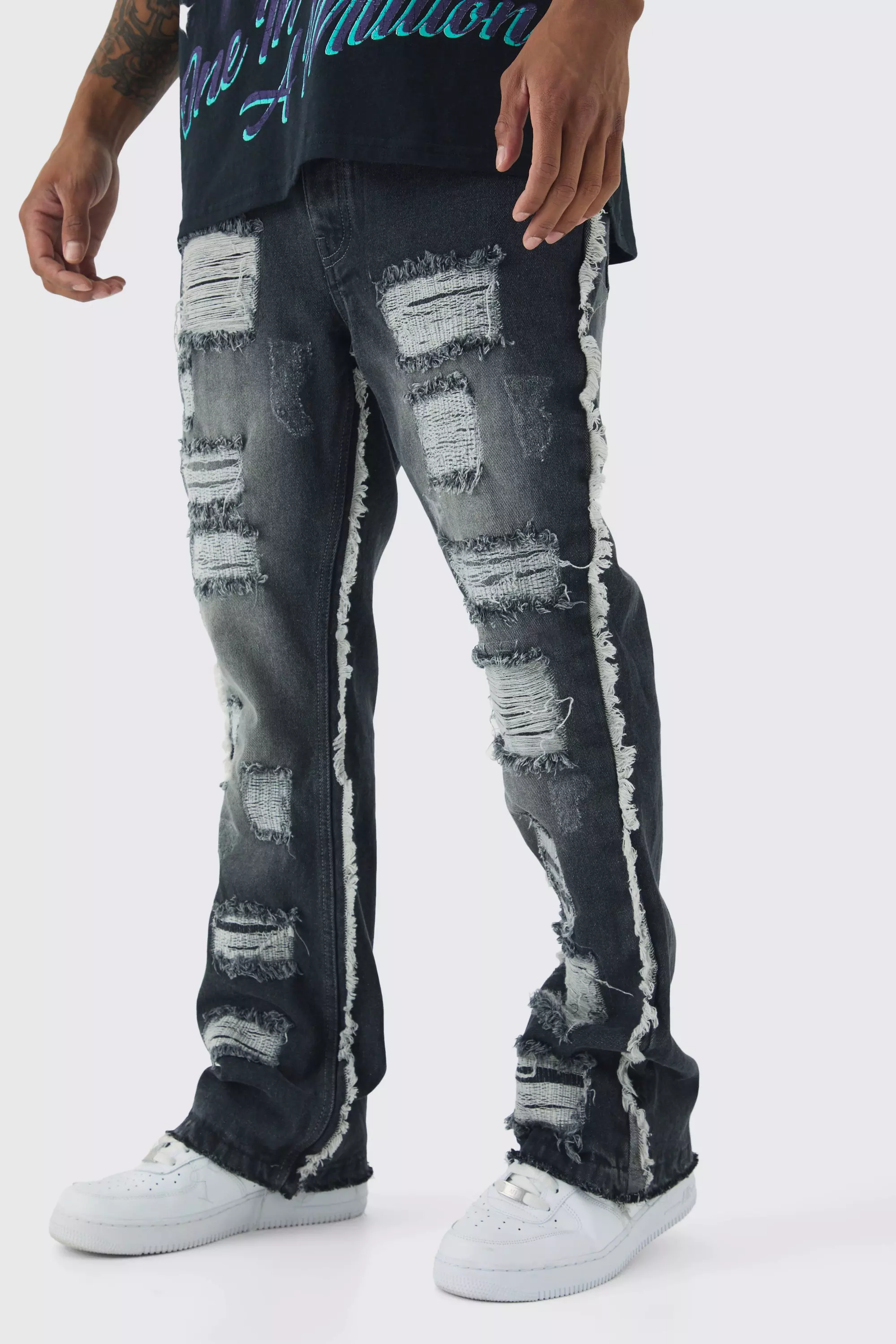 Slim Flared All Over Ripped Jeans With Let Down Hem | boohooMAN USA