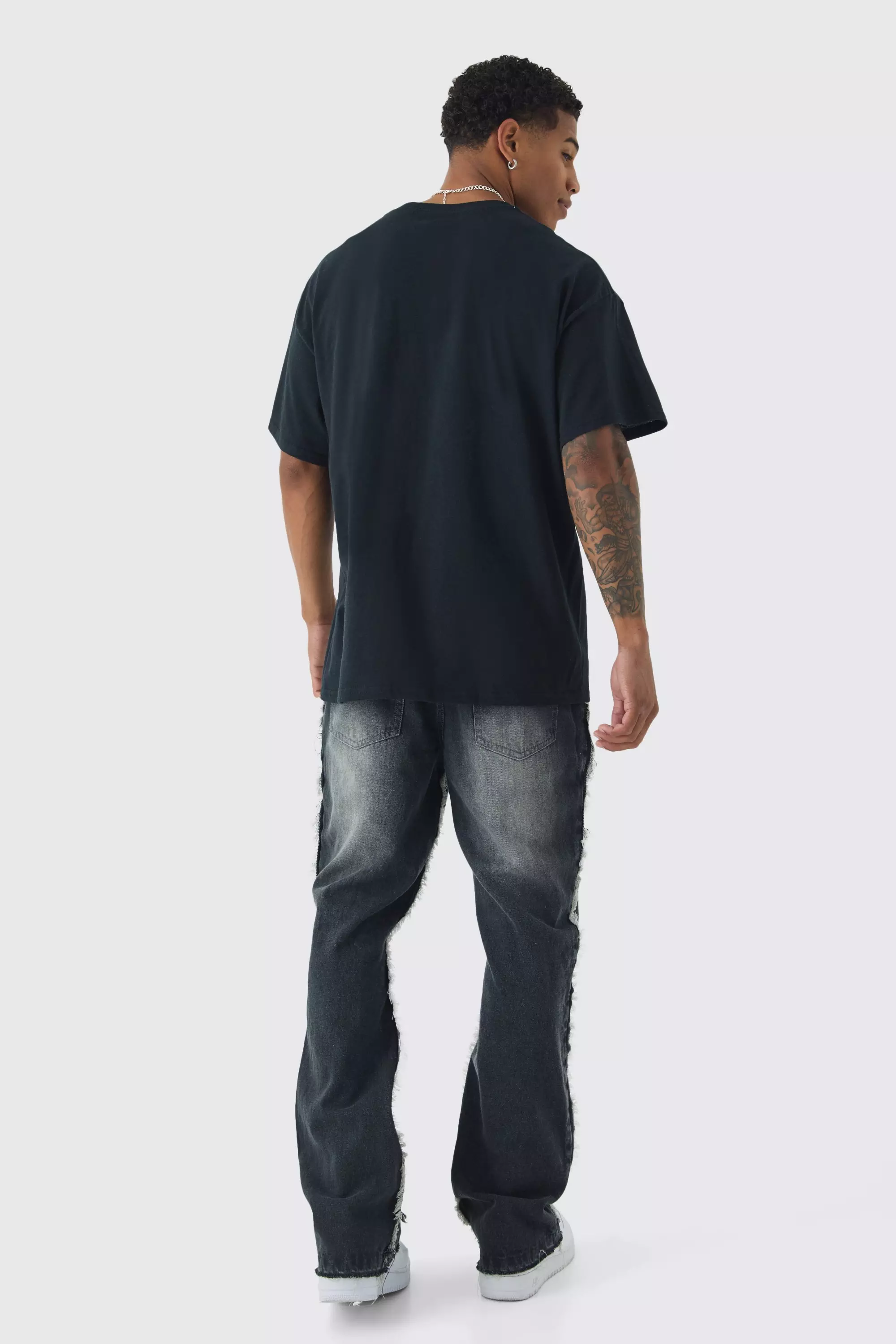 Slim Flared All Over Ripped Jeans With Let Down Hem | boohooMAN USA