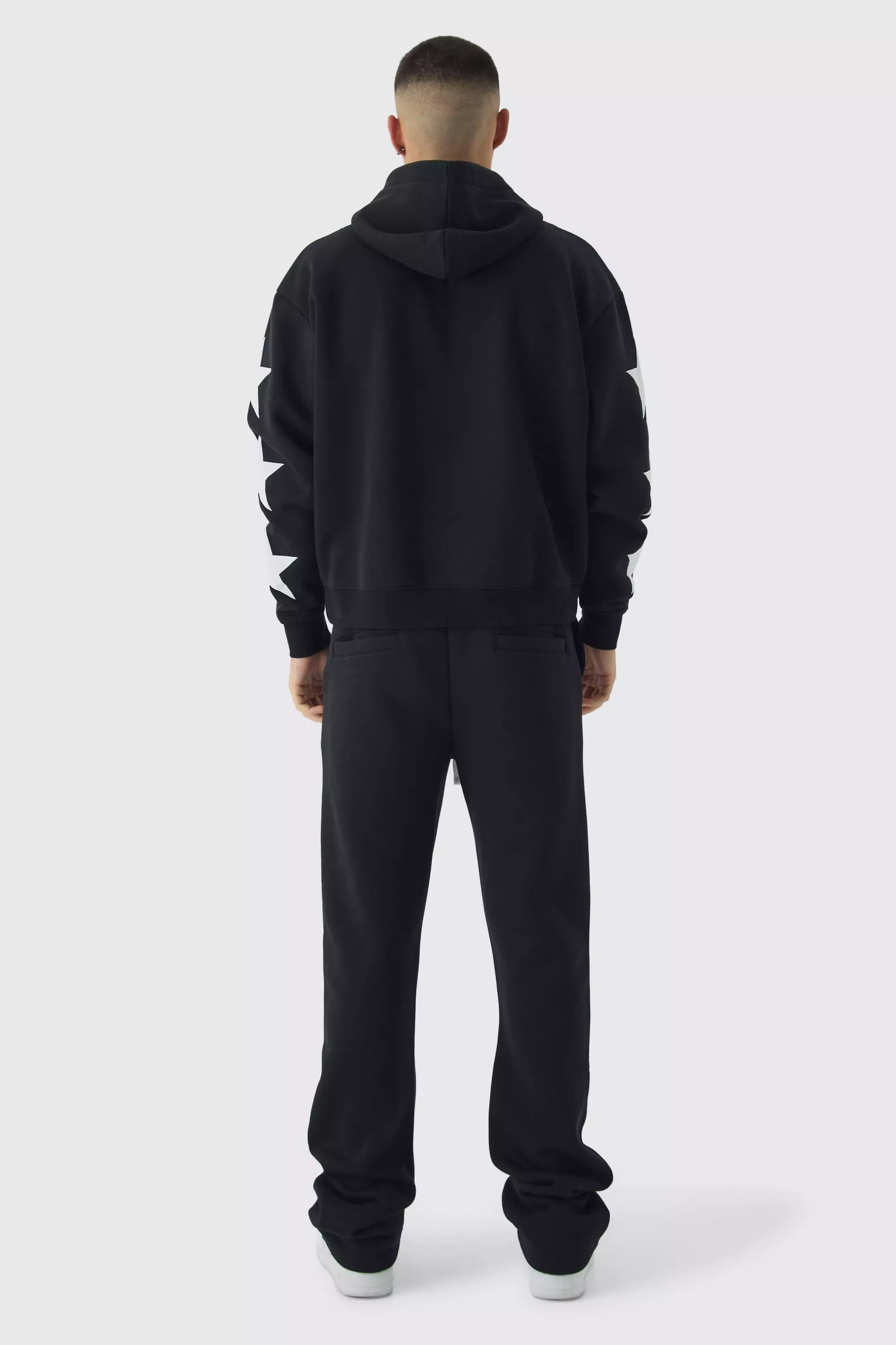 Slim-Fit Schlag-Jogginghose mit Superstar-Print, Black alternatives Bild