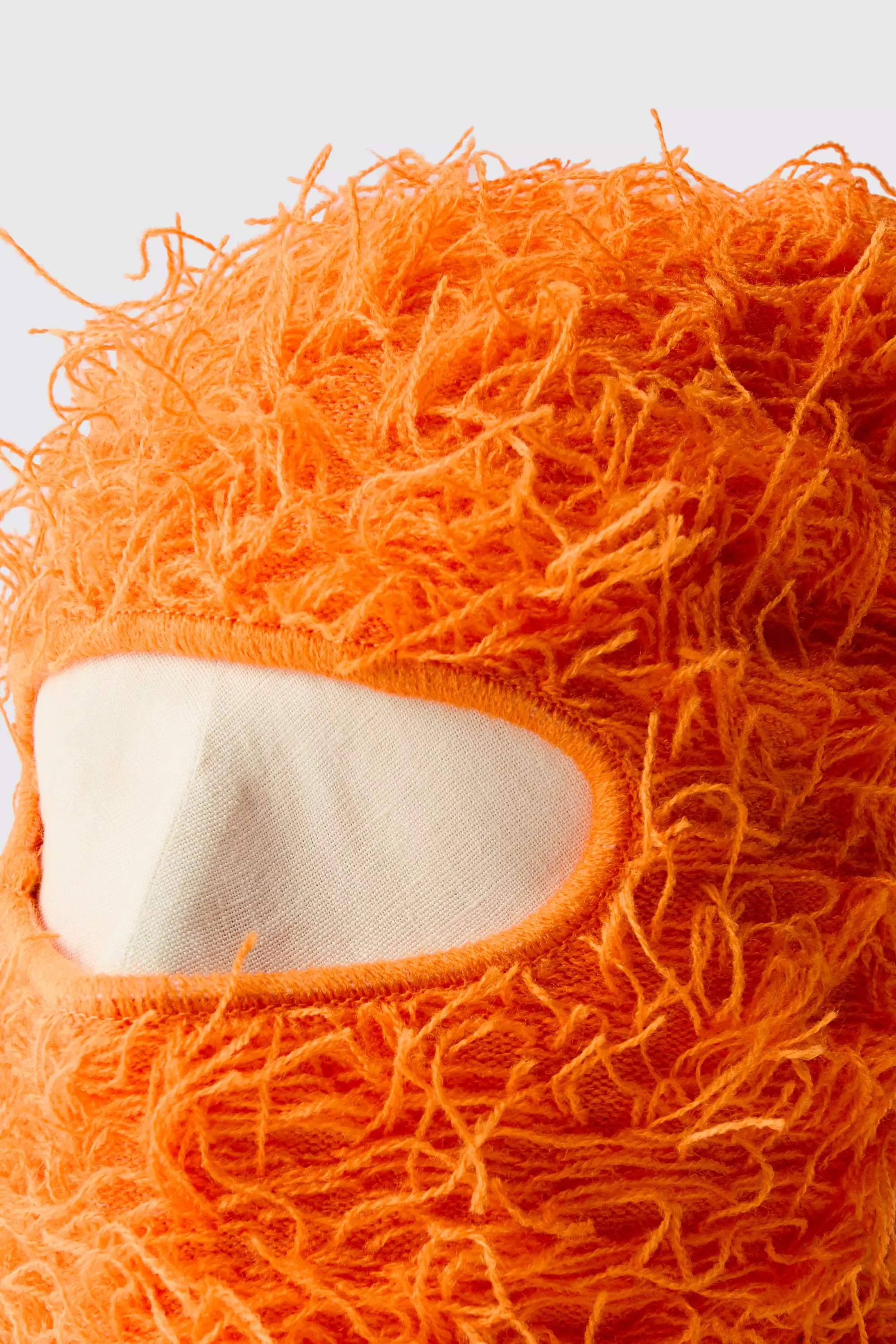 Cache-cœur en maille orange autre image