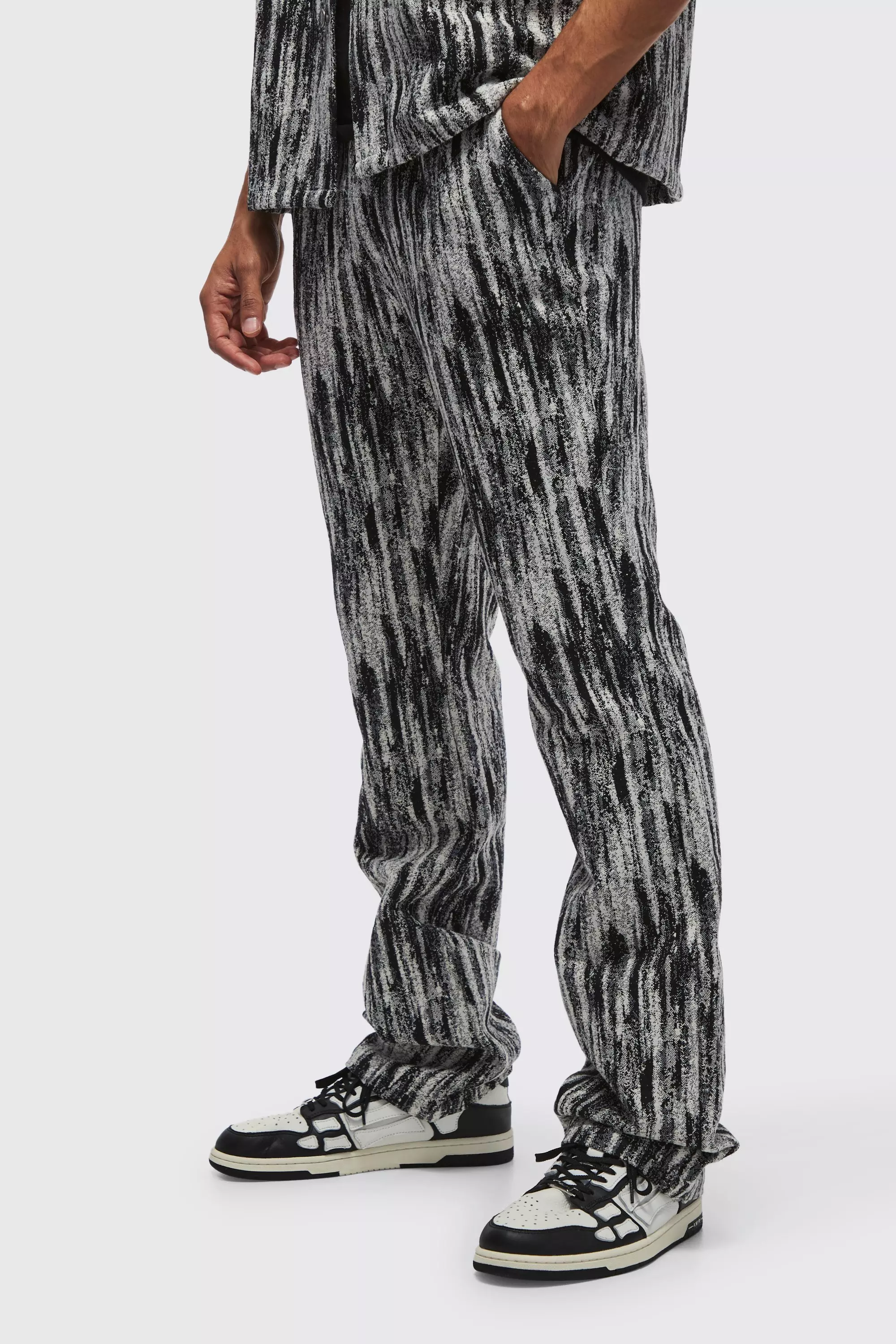 Black Slim Flared Stacked Abstract Tapestry Pants