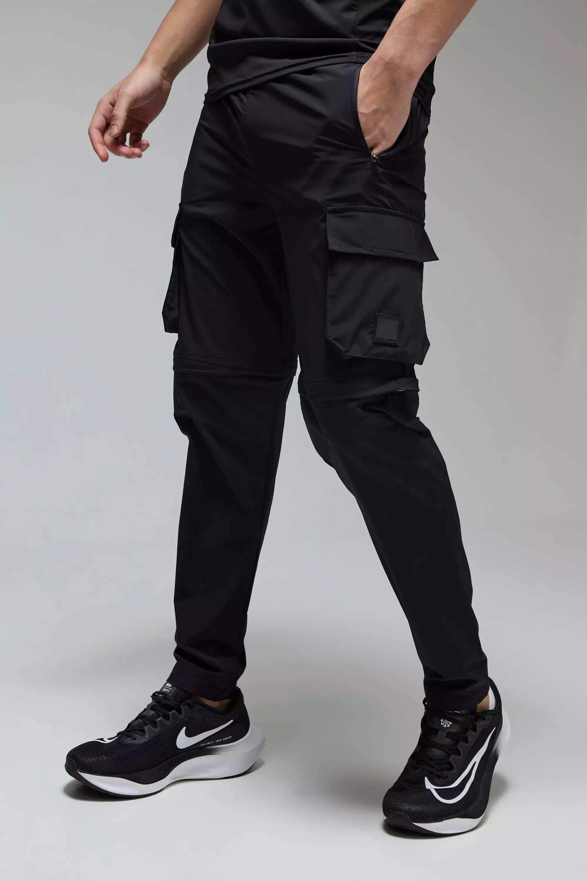 Man Active Cargo Zip Off Tapered Jogger boohooMAN IE