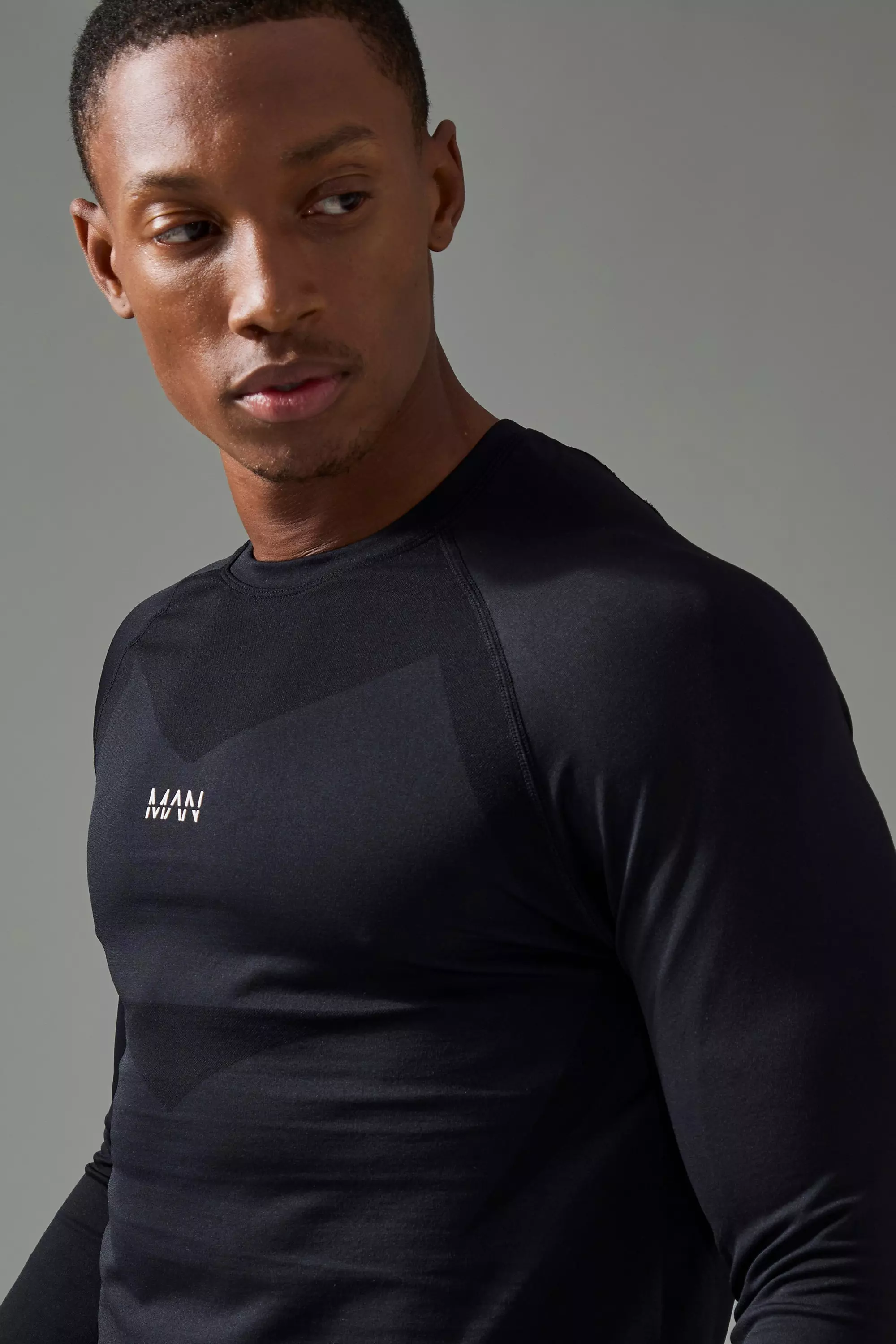 Nahtloses Man Active Baseball-Top, Black alternatives Bild