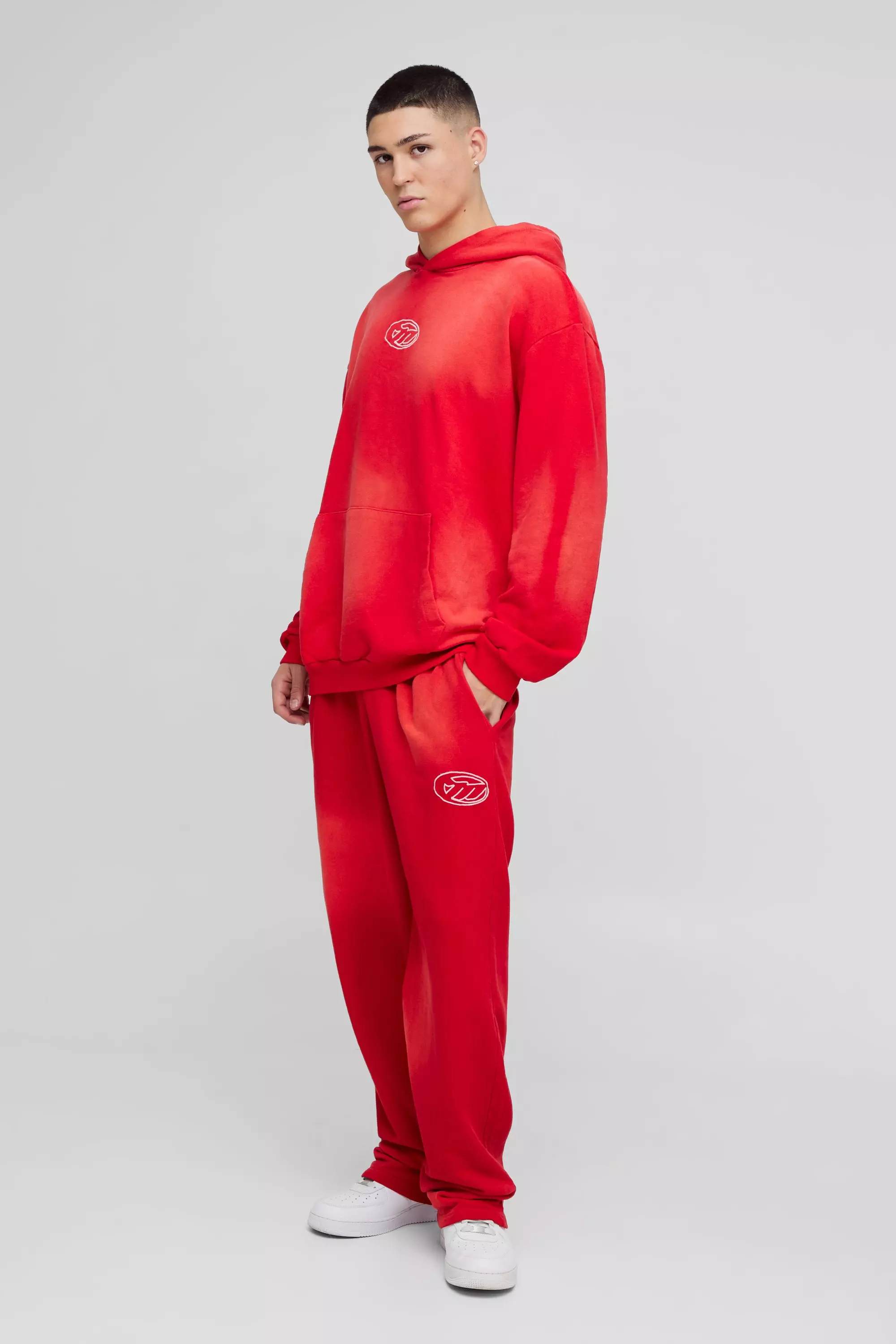 BoohooMAN Men s Oversized Boxy M Wash and Applique Hooded Tracksuit Red Tracksuits