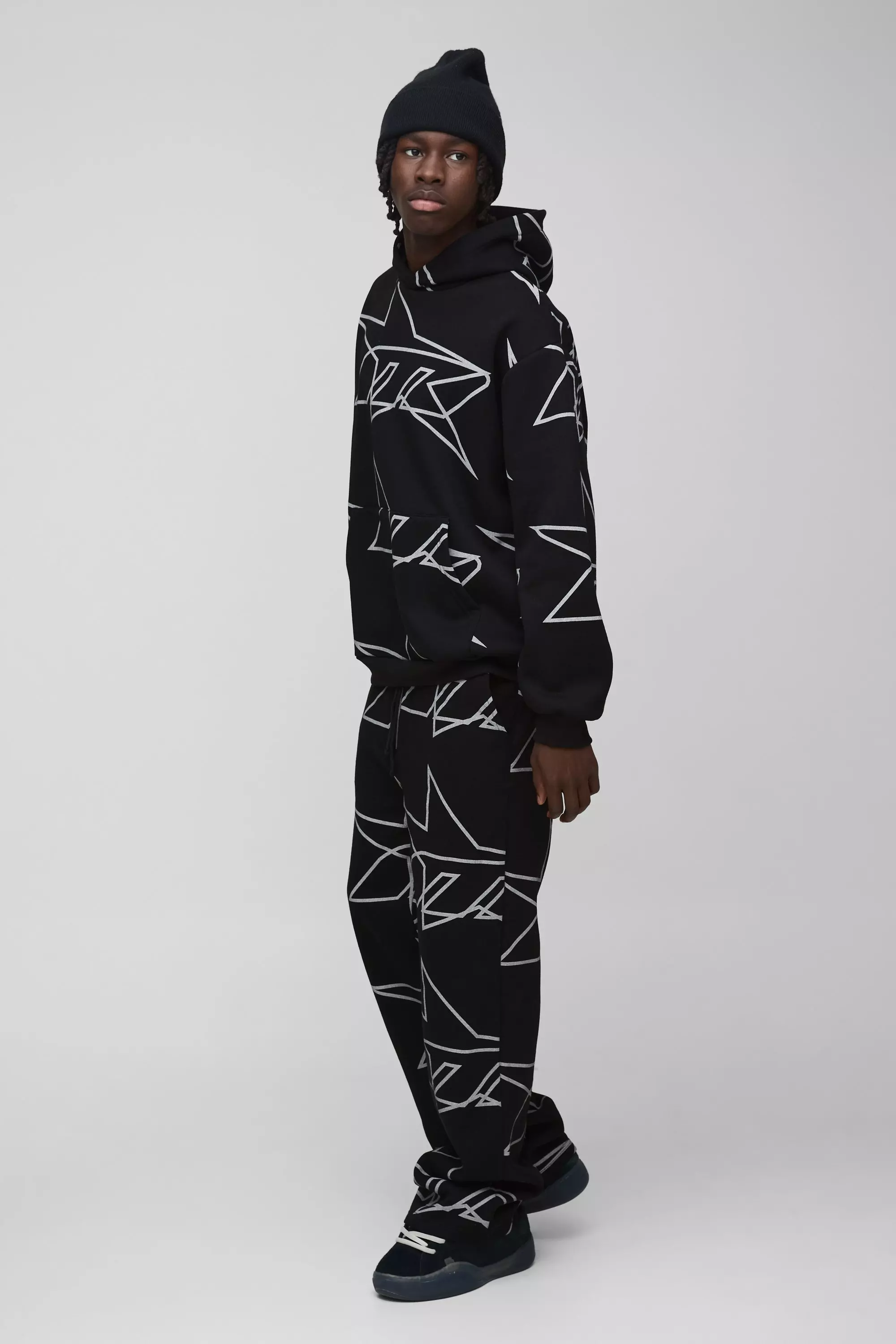 Oversized Star All Over Printed Gusset Flare Hooded Tracksuit boohooMAN USA