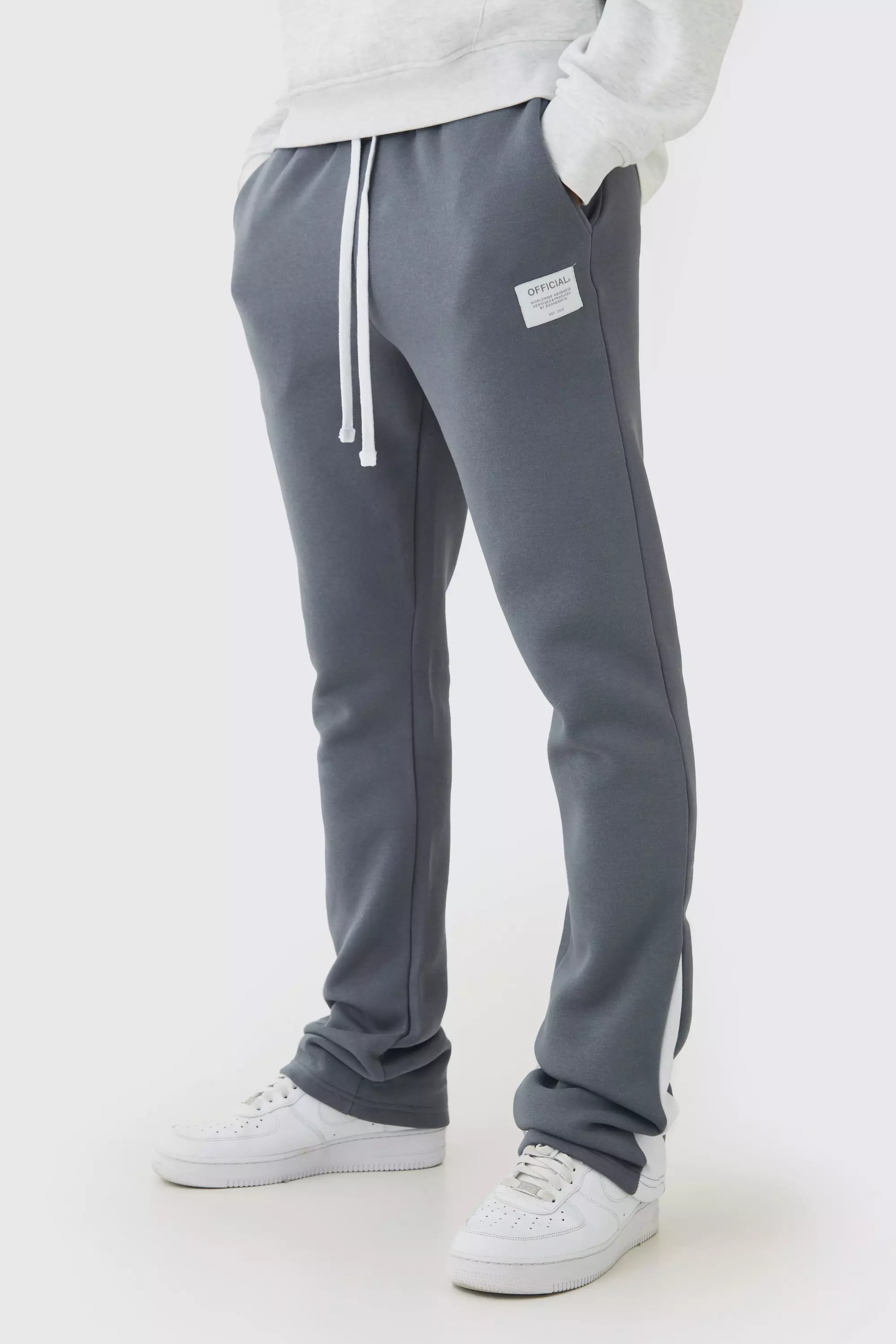Slim Fit Flare Stacked Woven Tab Gusset Sweatpants | boohooMAN USA
