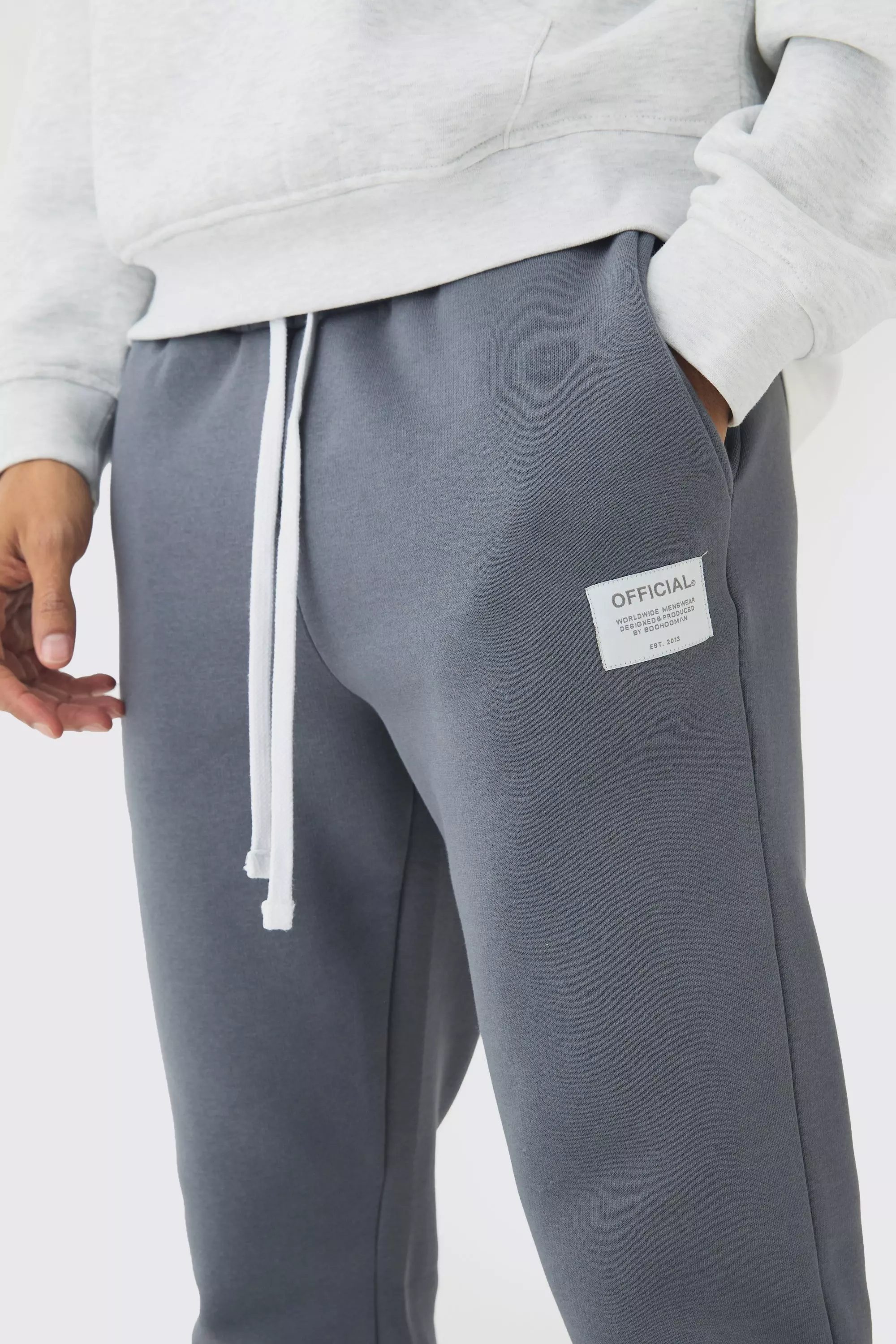 Slim Fit Flare Stacked Woven Tab Gusset Sweatpants | boohooMAN USA