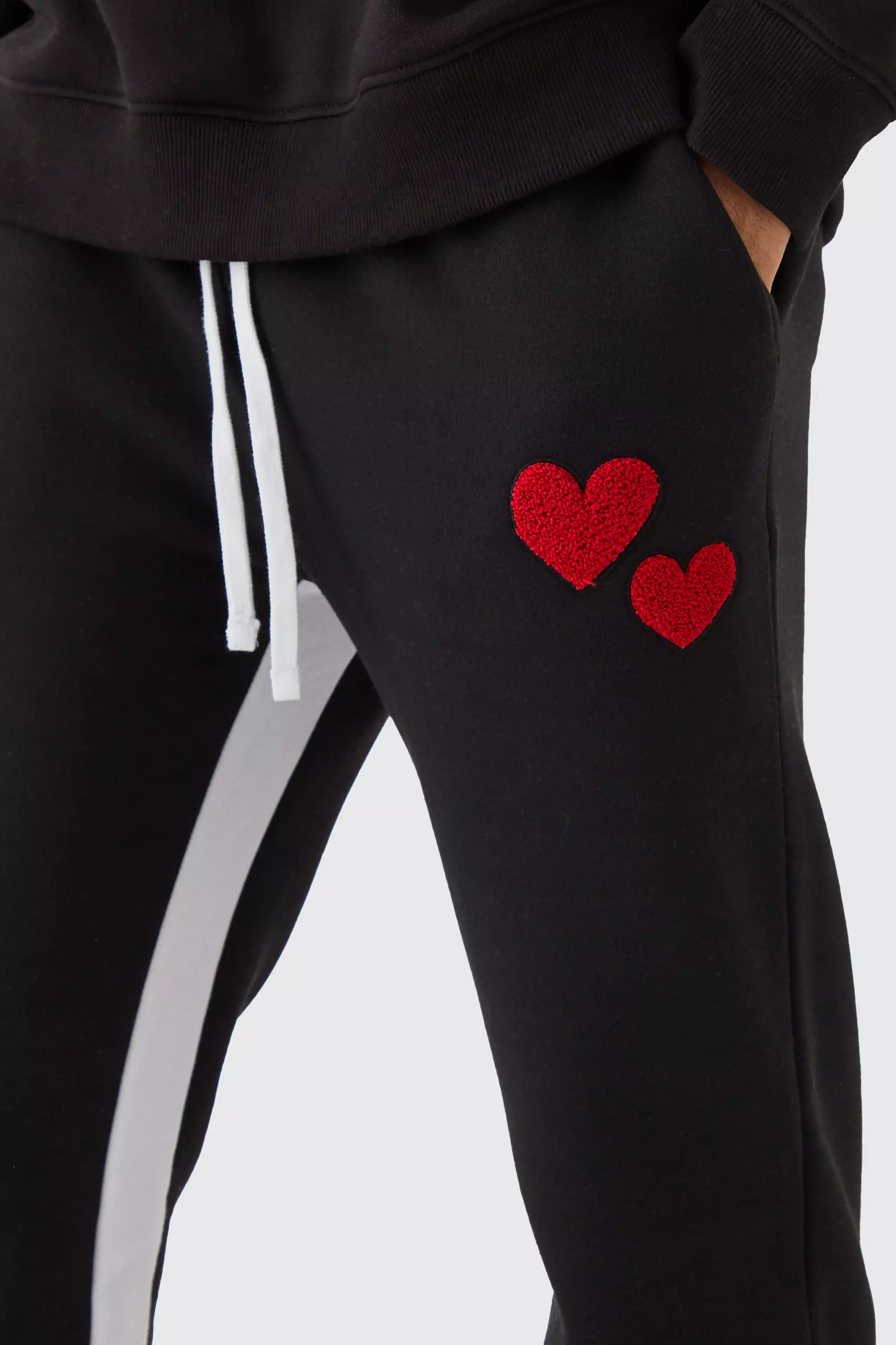 Borg-Jogginghose mit Herz-Applikation, Black alternatives Bild