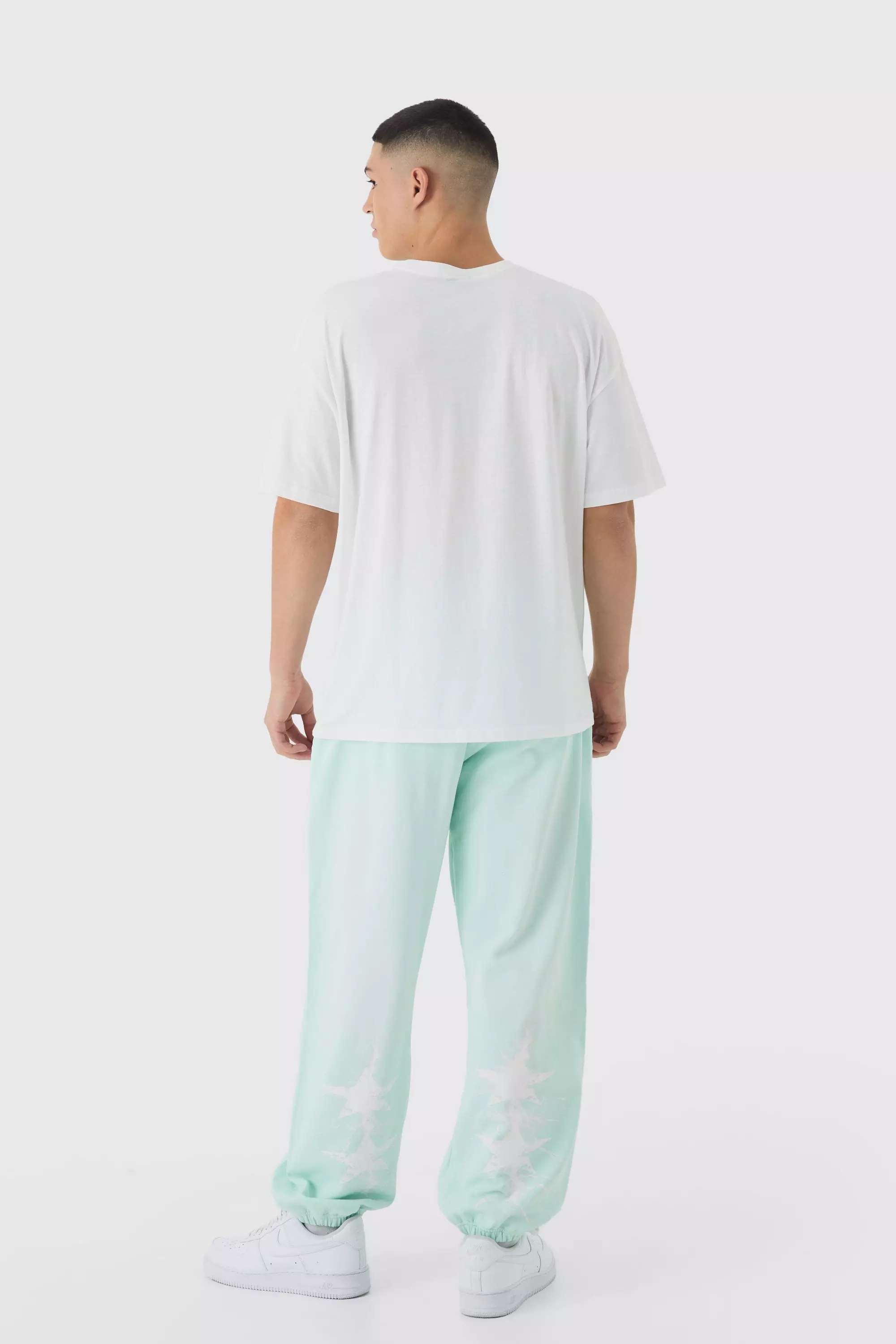 Turquoise Oversized Worldwide Spray Wash Printed Joggers alternative image