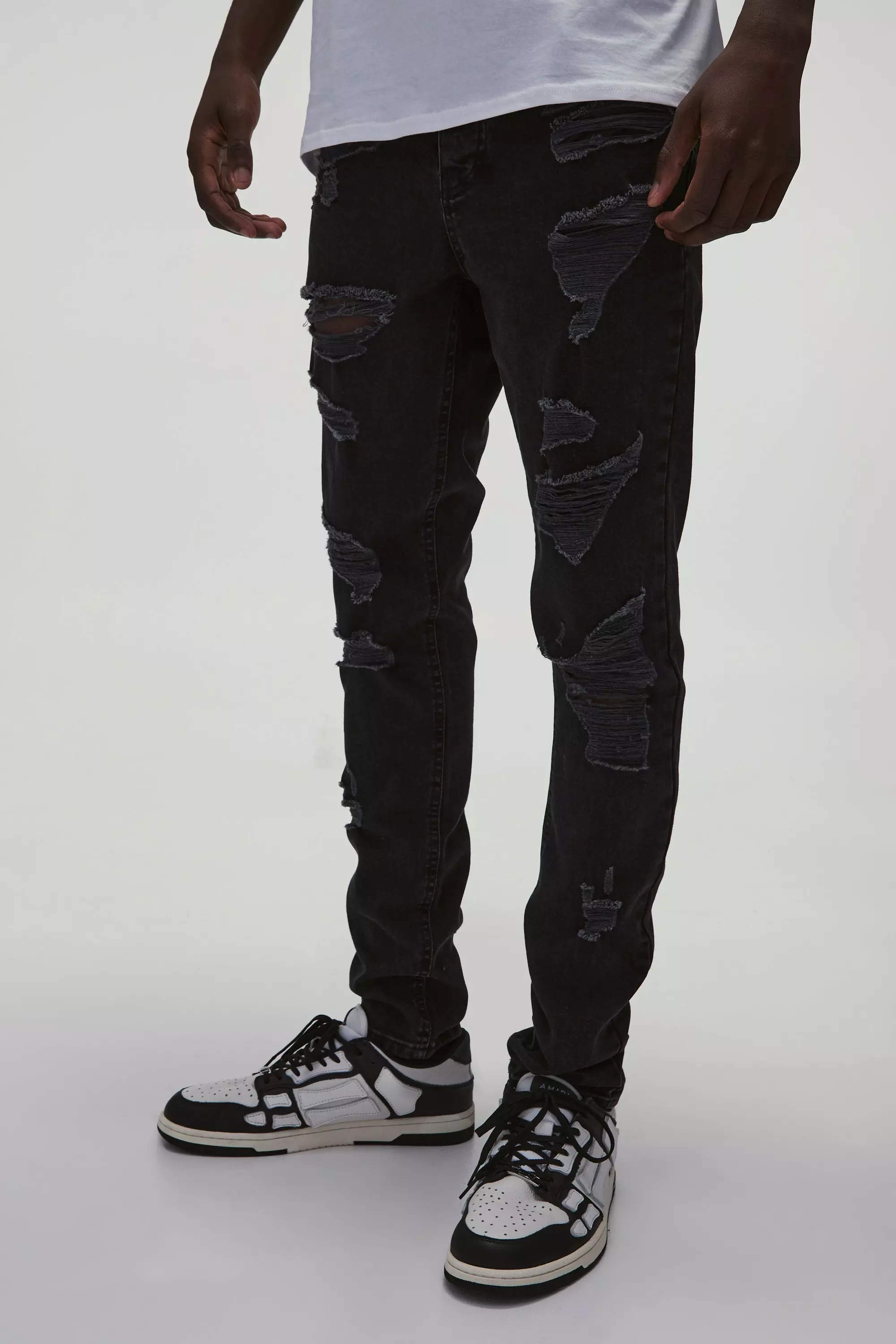 True black Skinny Stretch All Over Rip Denim Jeans alternative image