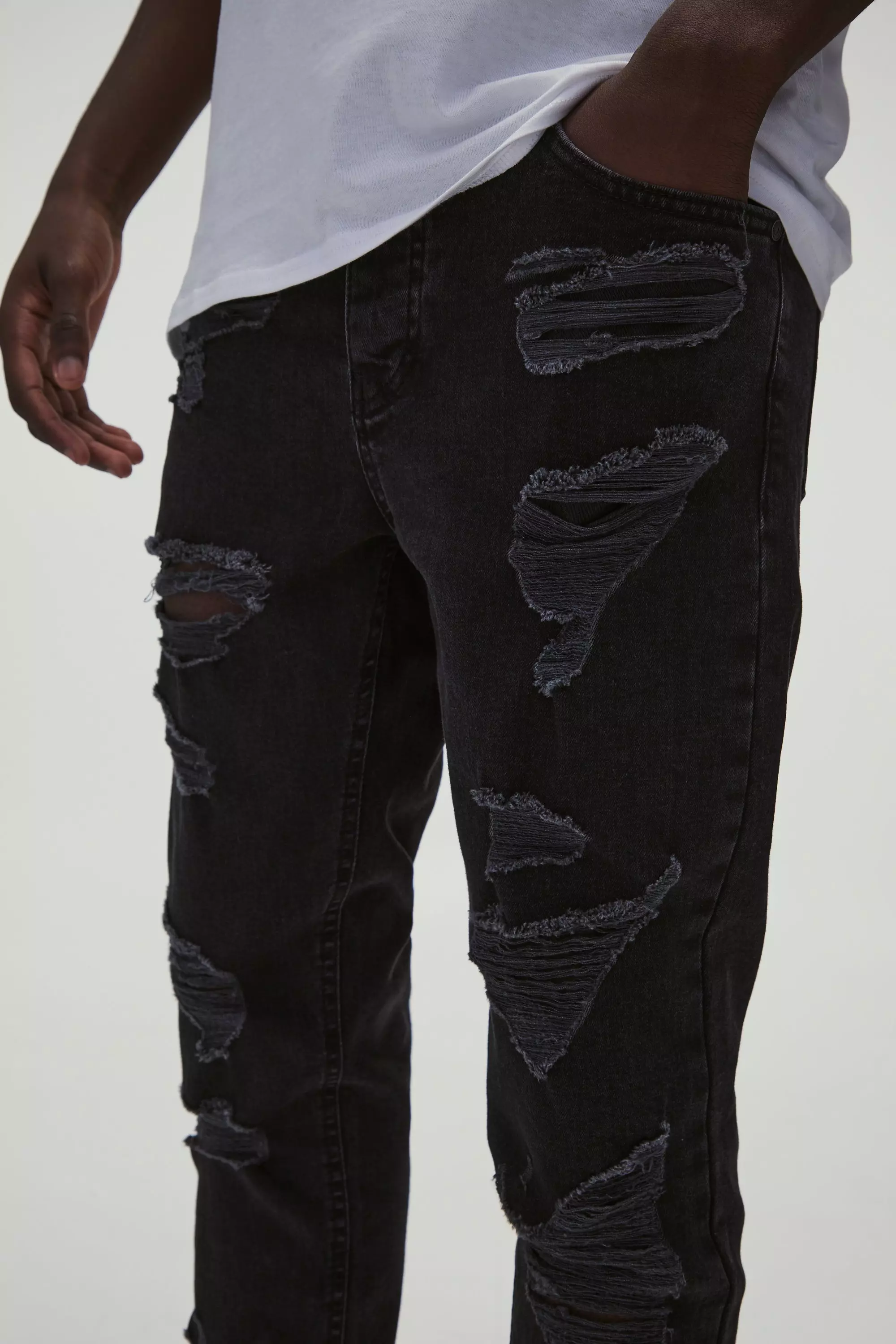 True black Skinny Stretch All Over Rip Denim Jeans alternative image
