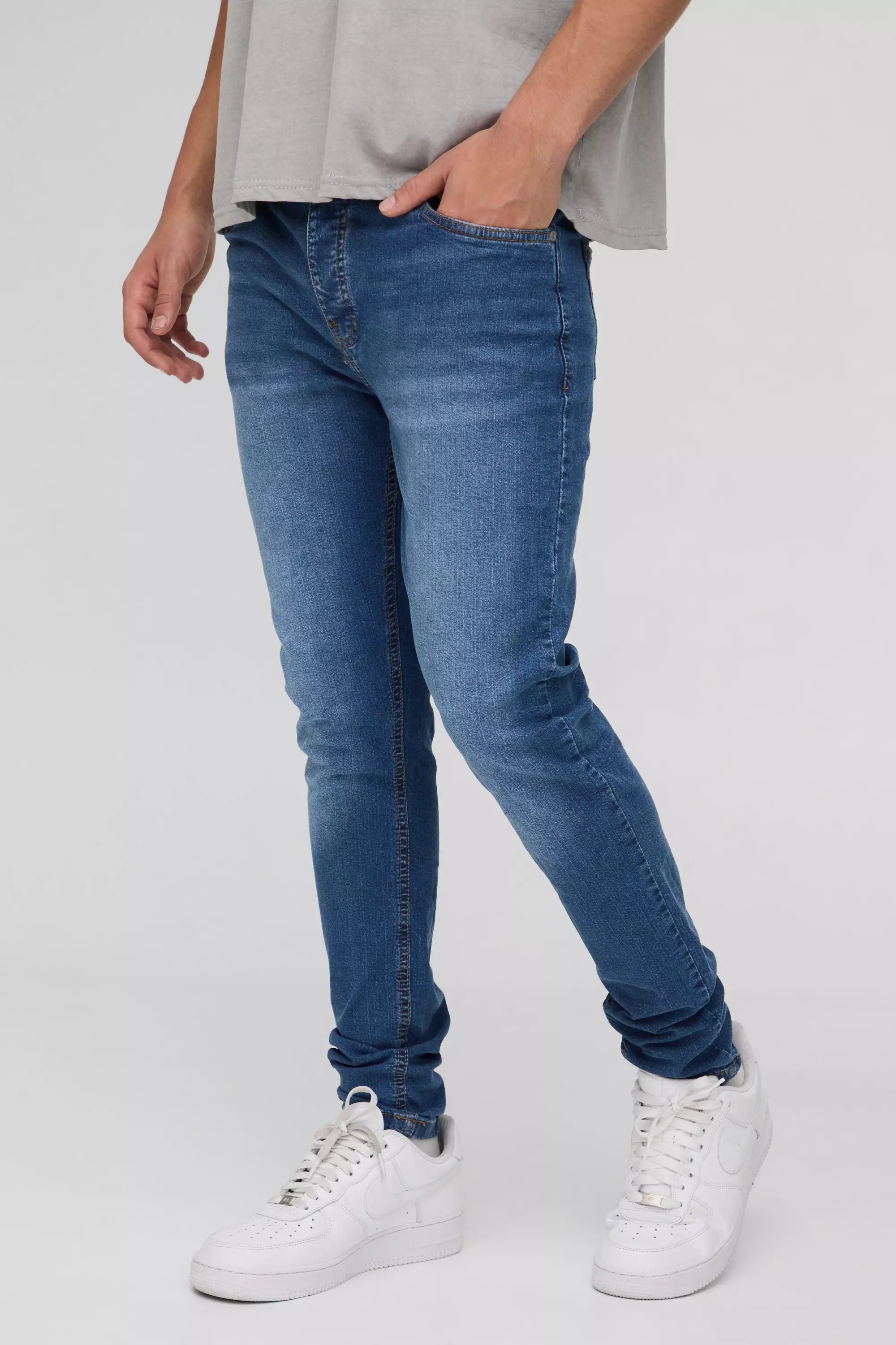 Skinny Washed Stretch Jean in Mid Blue Wash | boohooMAN USA