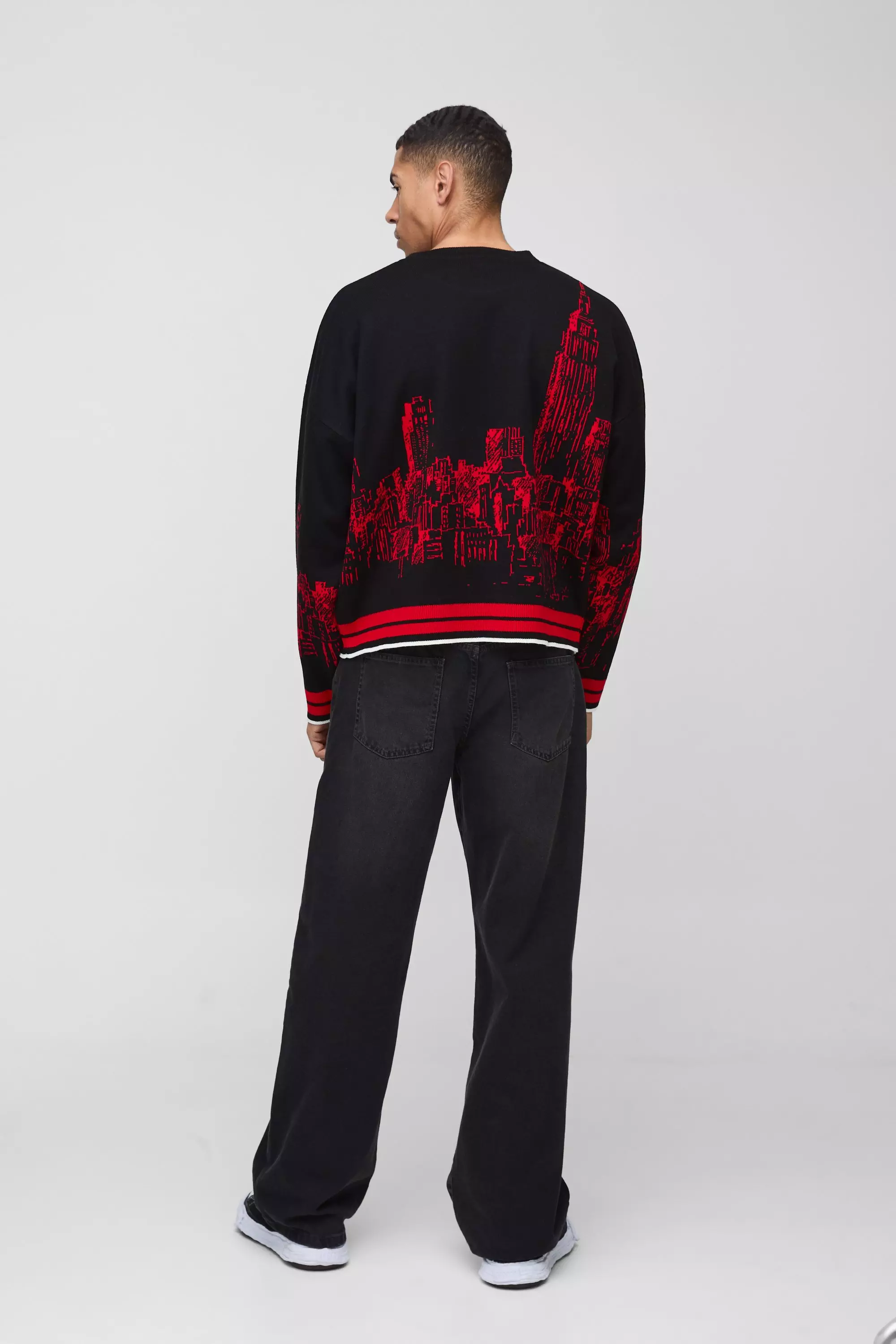 Kastiger Strickpullover mit City Jacquard Print, Black alternatives Bild