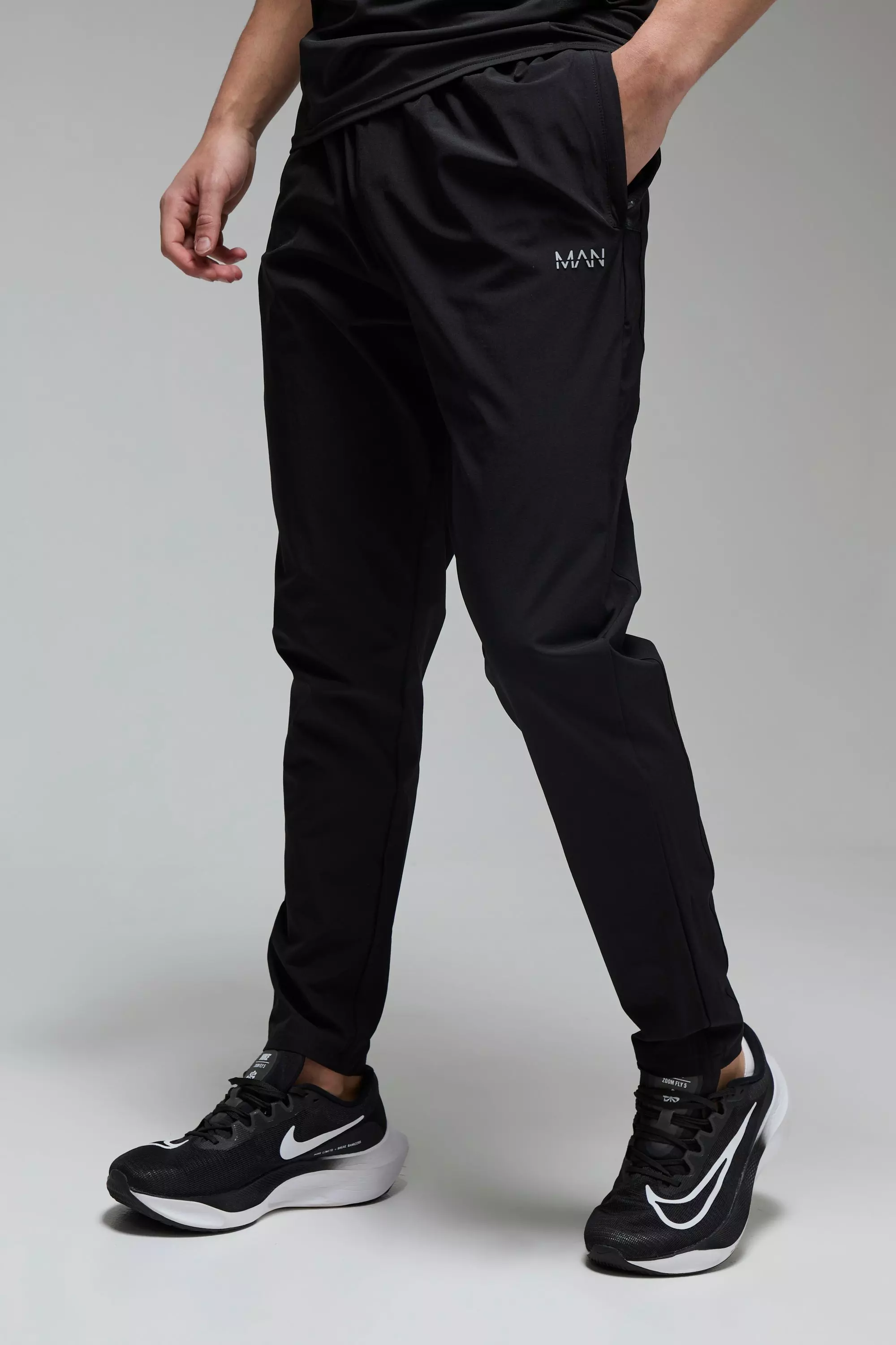 Man Active Stretch Woven Tapered Joggers | boohooMAN USA