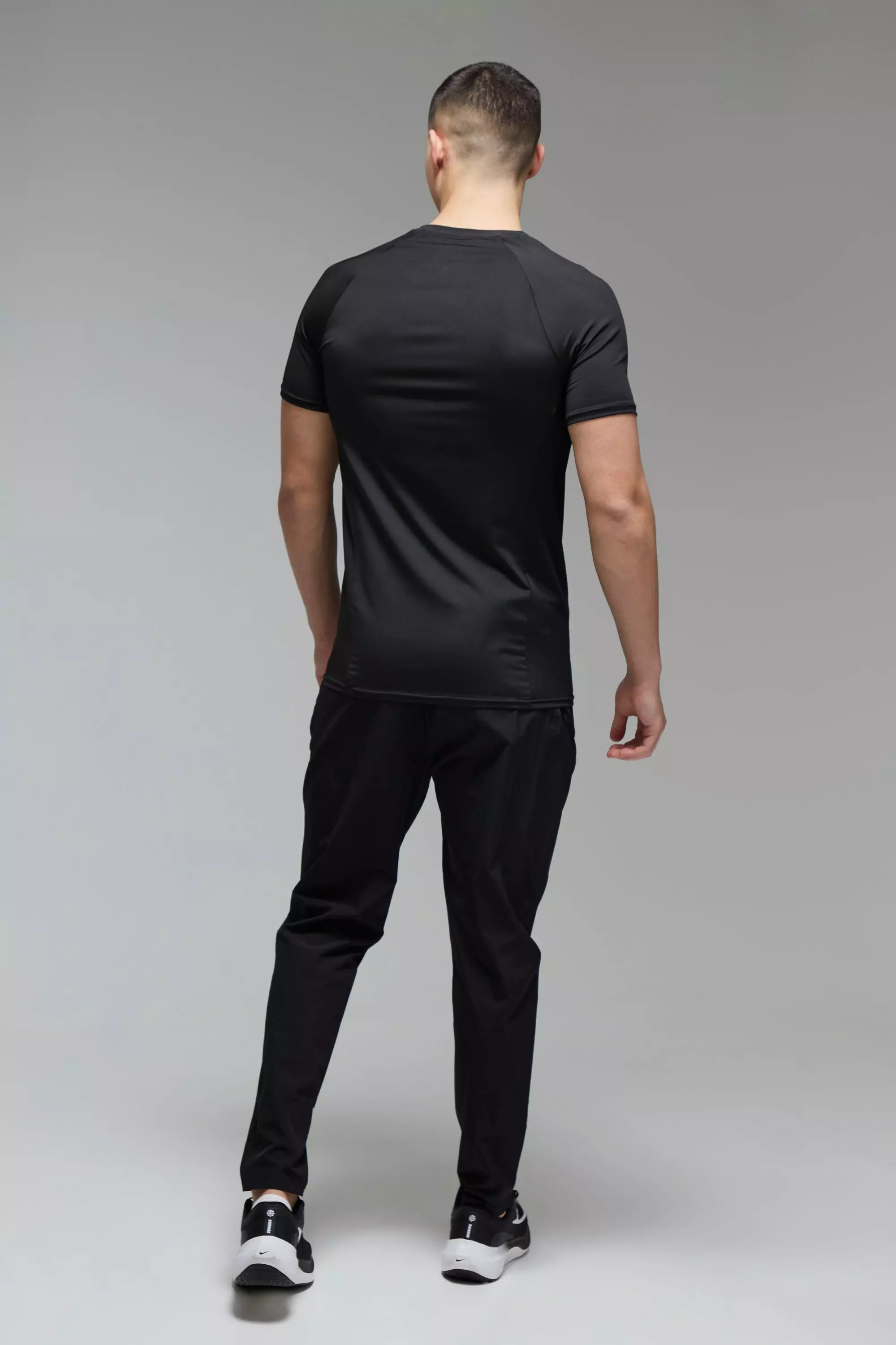 Man Active Stretch Woven Tapered Joggers | boohooMAN USA