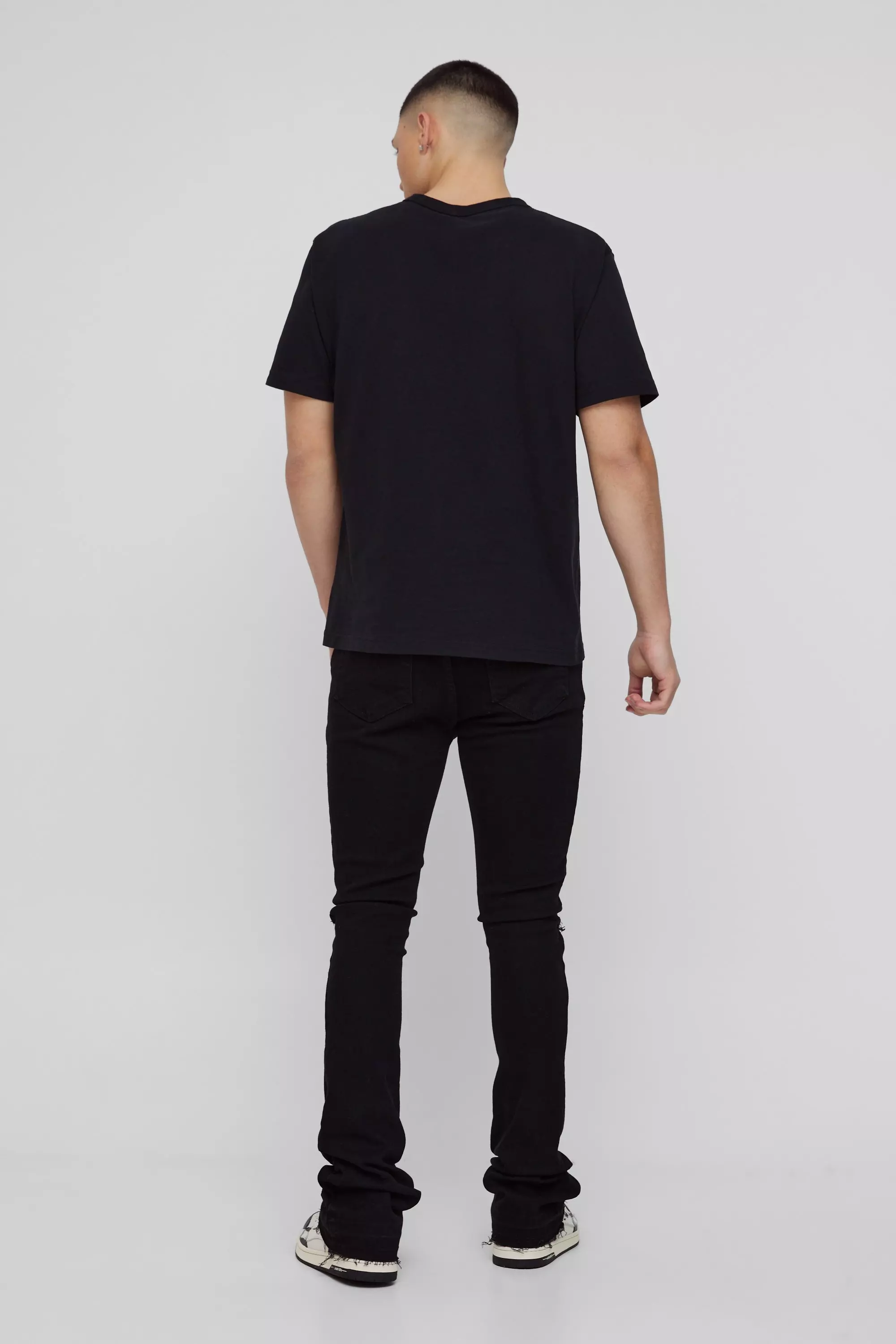 Skinny Stacked Flared Ripped Knee Jeans | boohooMAN USA