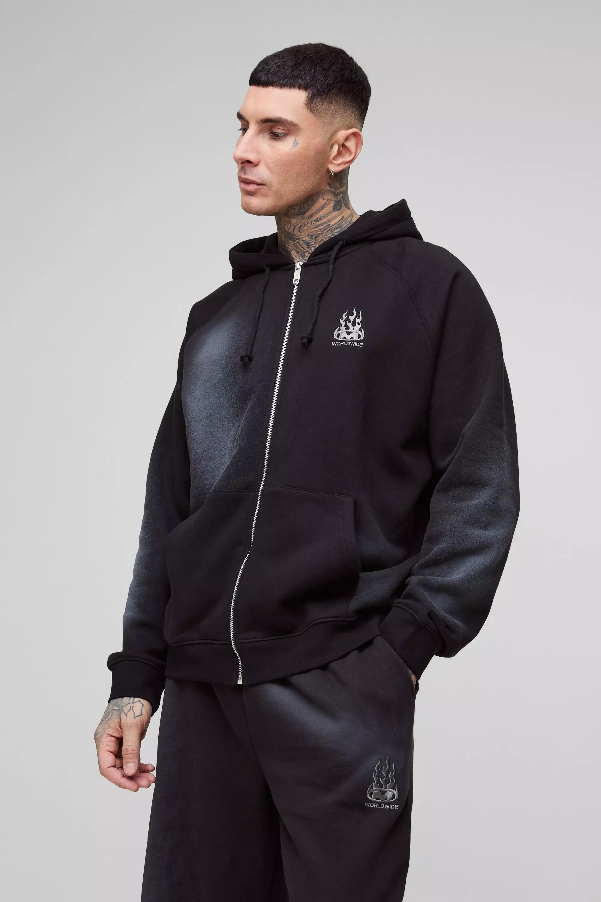 Tall Oversized Raglan Zip Thru Embroidered Spray Wash Hooded Tracksuit | boohooMAN USA