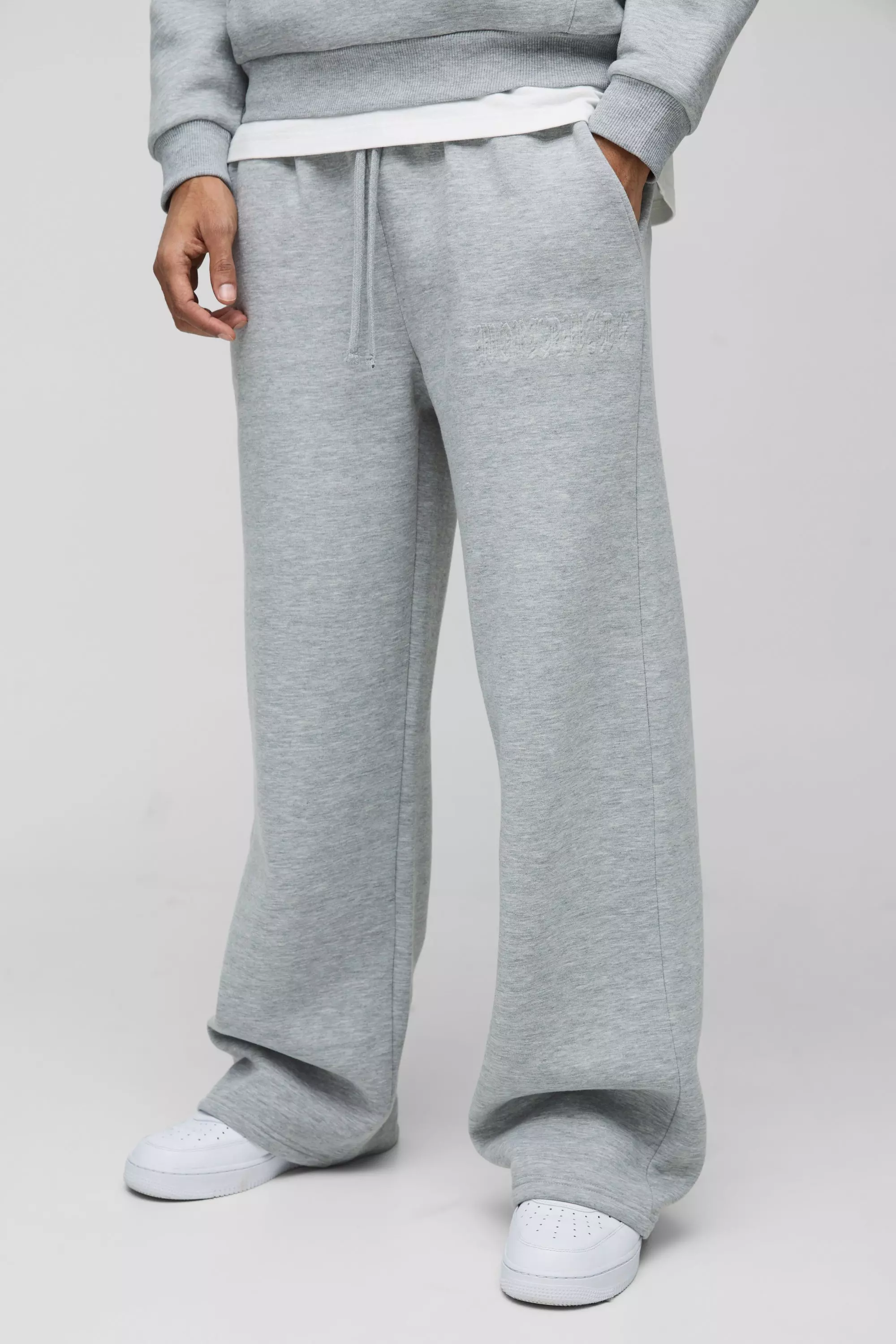 Wide Leg Worldwide Embossed Sweatpants | boohooMAN USA