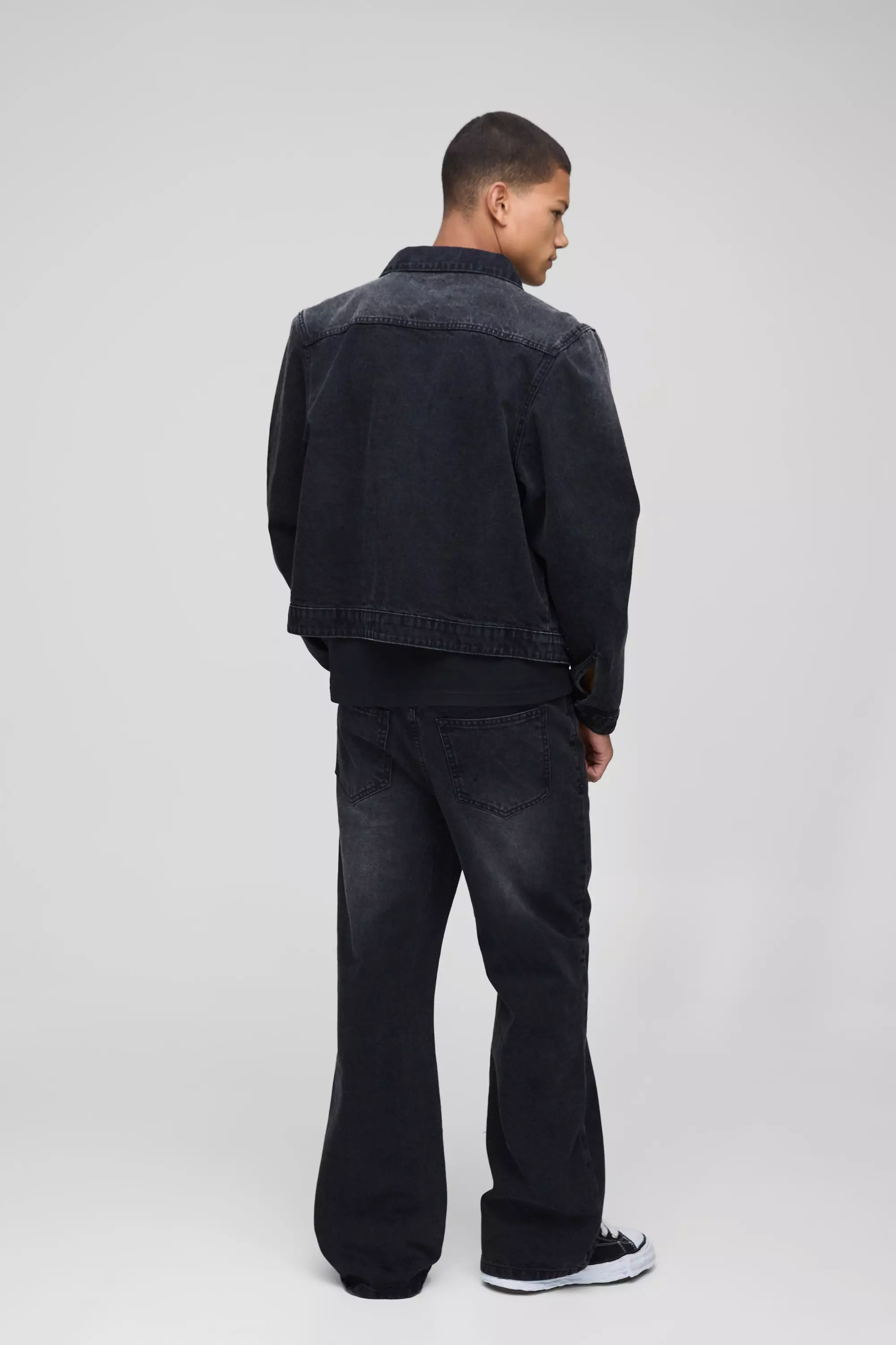 Relaxed Flare Washed Black Ripped Knee Jeans | boohooMAN USA