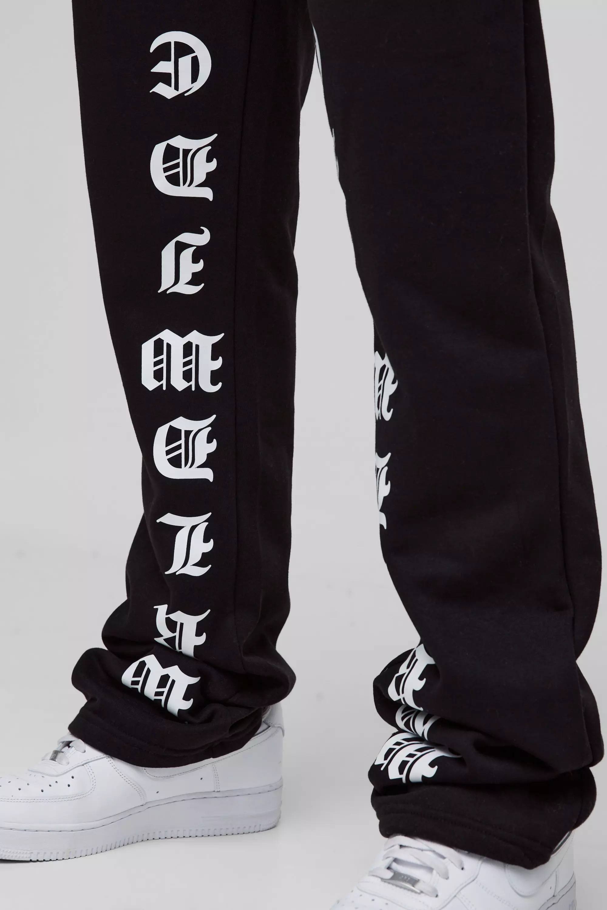 Slim-Fit Schlag-Jogginghose mit Print, Black alternatives Bild