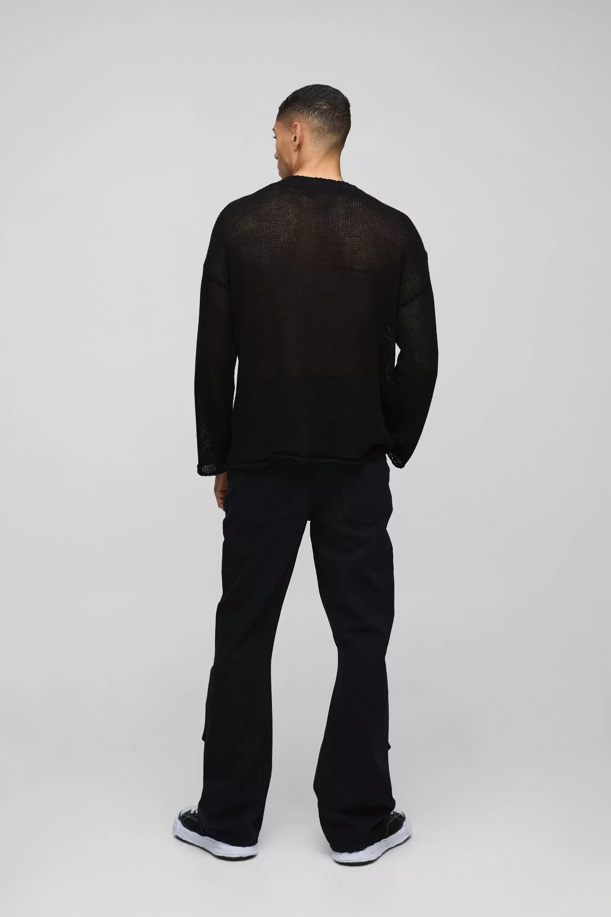Lockere Bootcut Schlagjeans mit Druckknöpfen, True black alternatives Bild