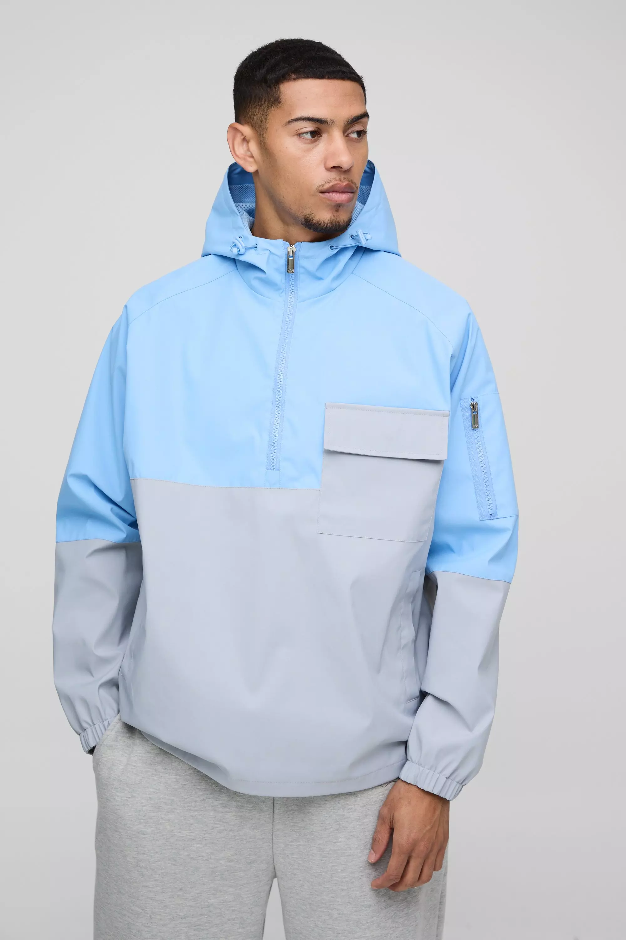 Oversized Colour Block Pocket Detail Hooded Cagoule Raincoat Light blue