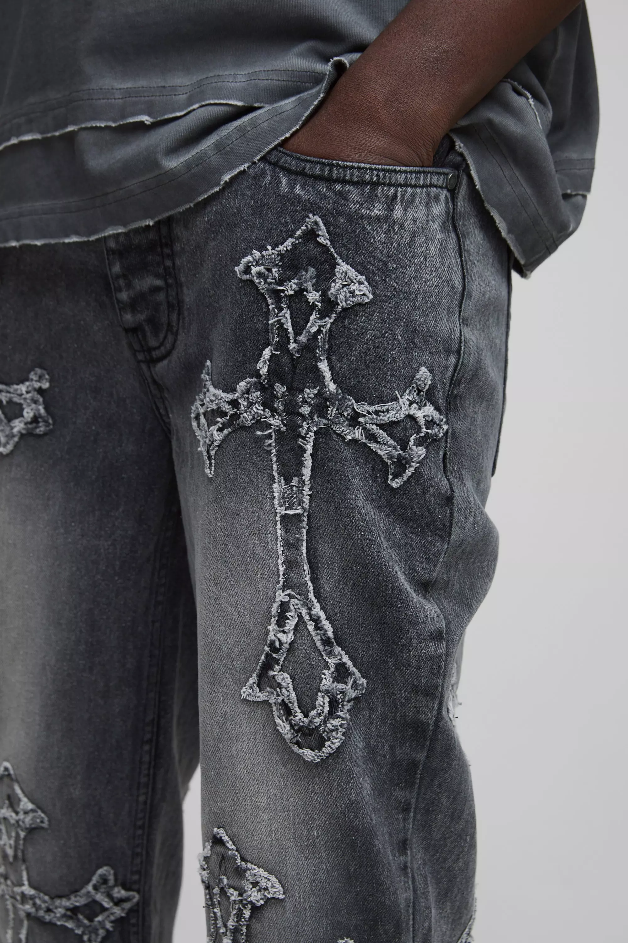 Slim Flared Acid Wash Cross Applique Gusset Jeans | boohooMAN UK