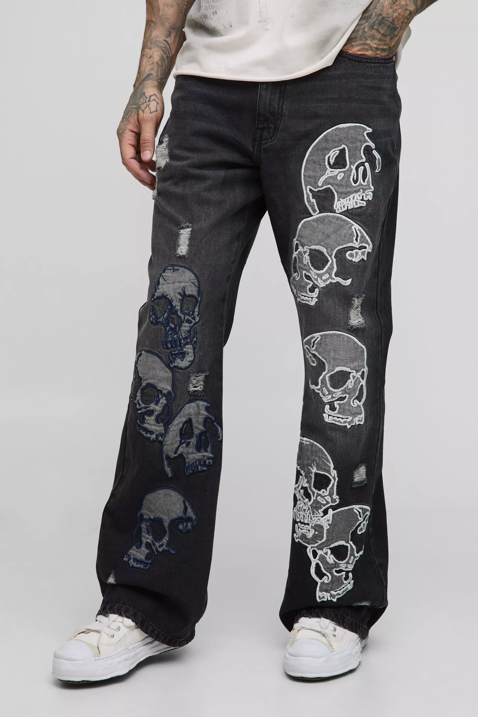 Tall Skull Applique Raw Hem Relaxed Flared Jeans | boohooMAN USA