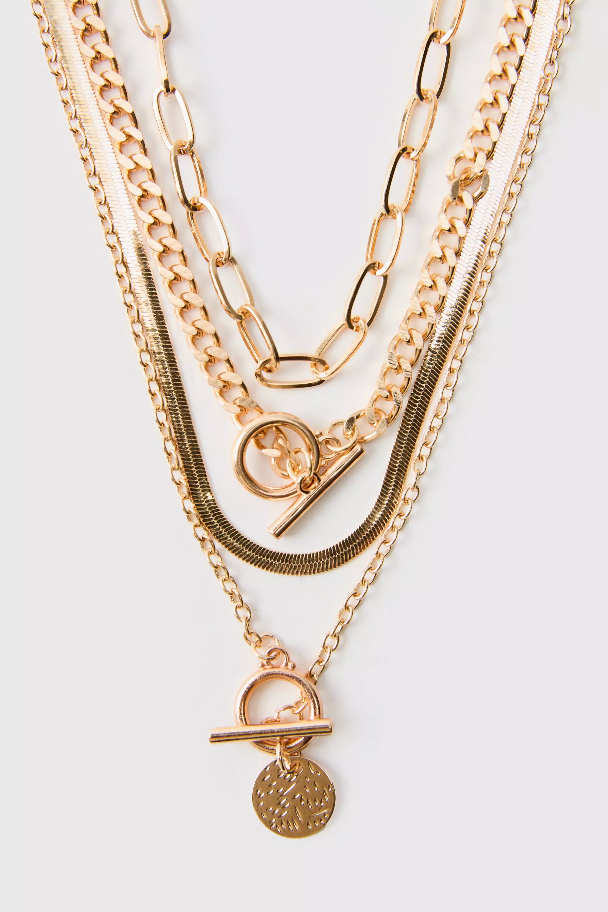 Mehrlagige goldene Kette mit Anhängern, Gold alternatives Bild