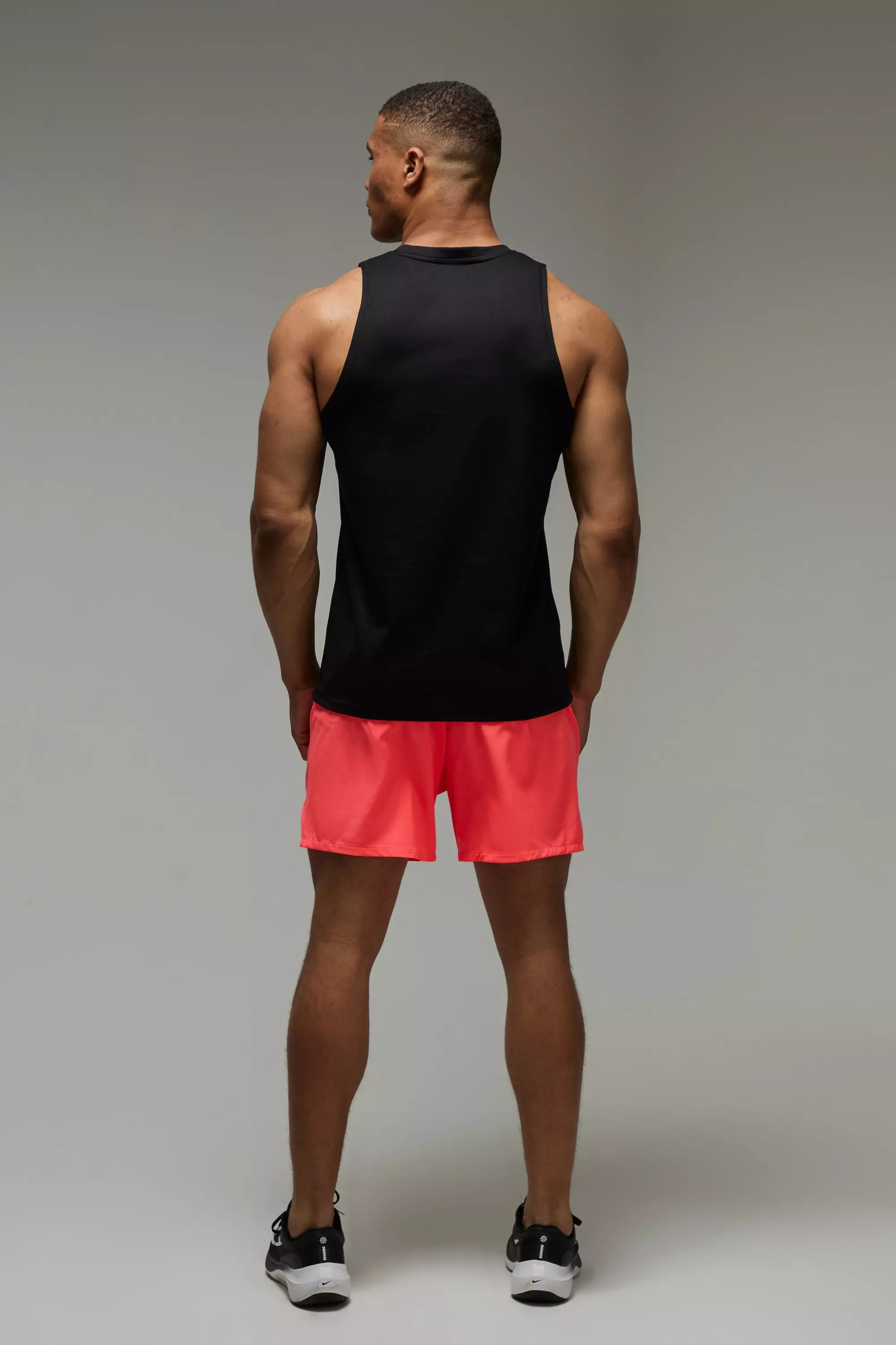 Man Active Perforated Stretch Woven Regular Fit 5inch Short | boohooMAN USA