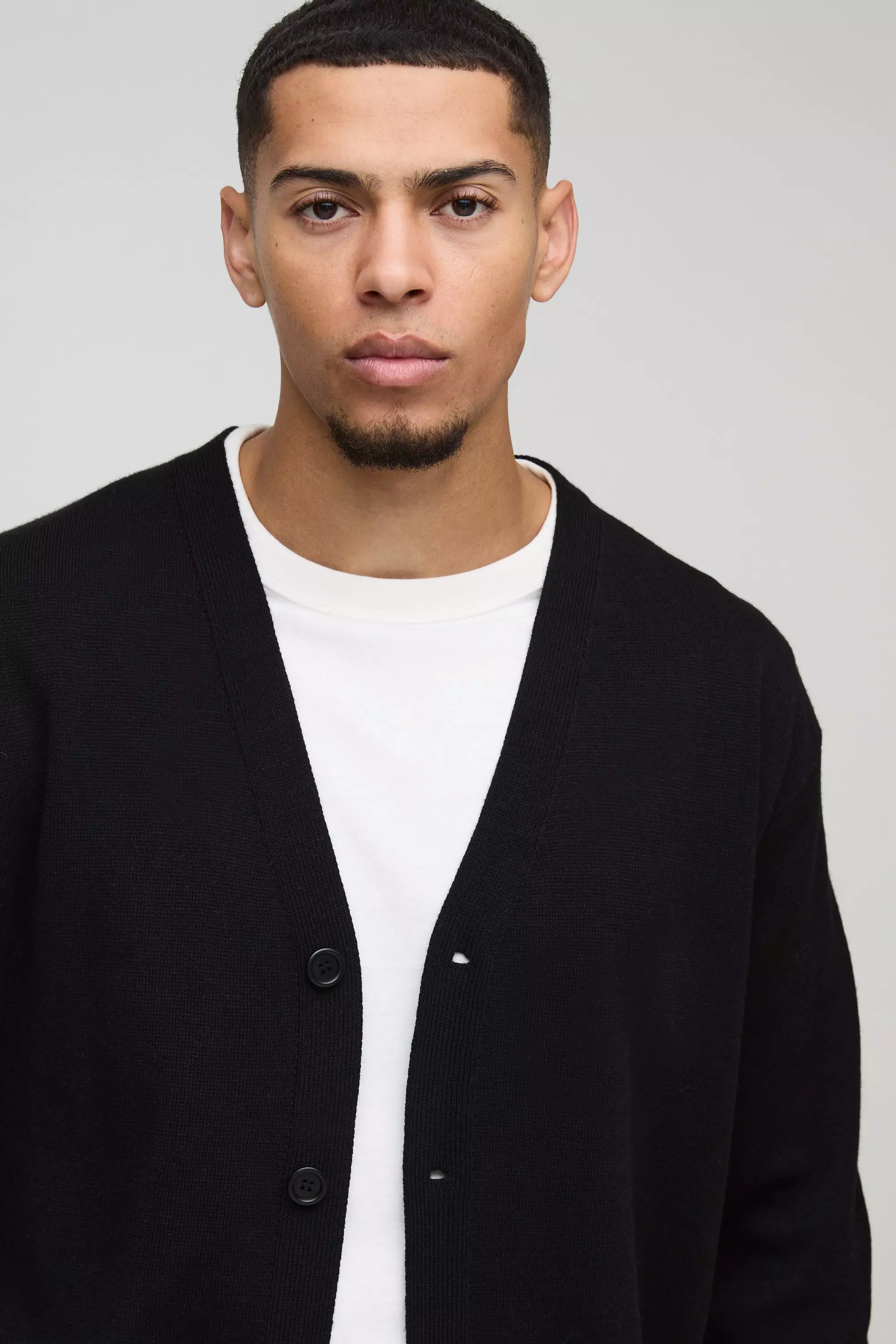 Kastiger Strick-Cardigan mit Kreuz-Print, Black alternatives Bild