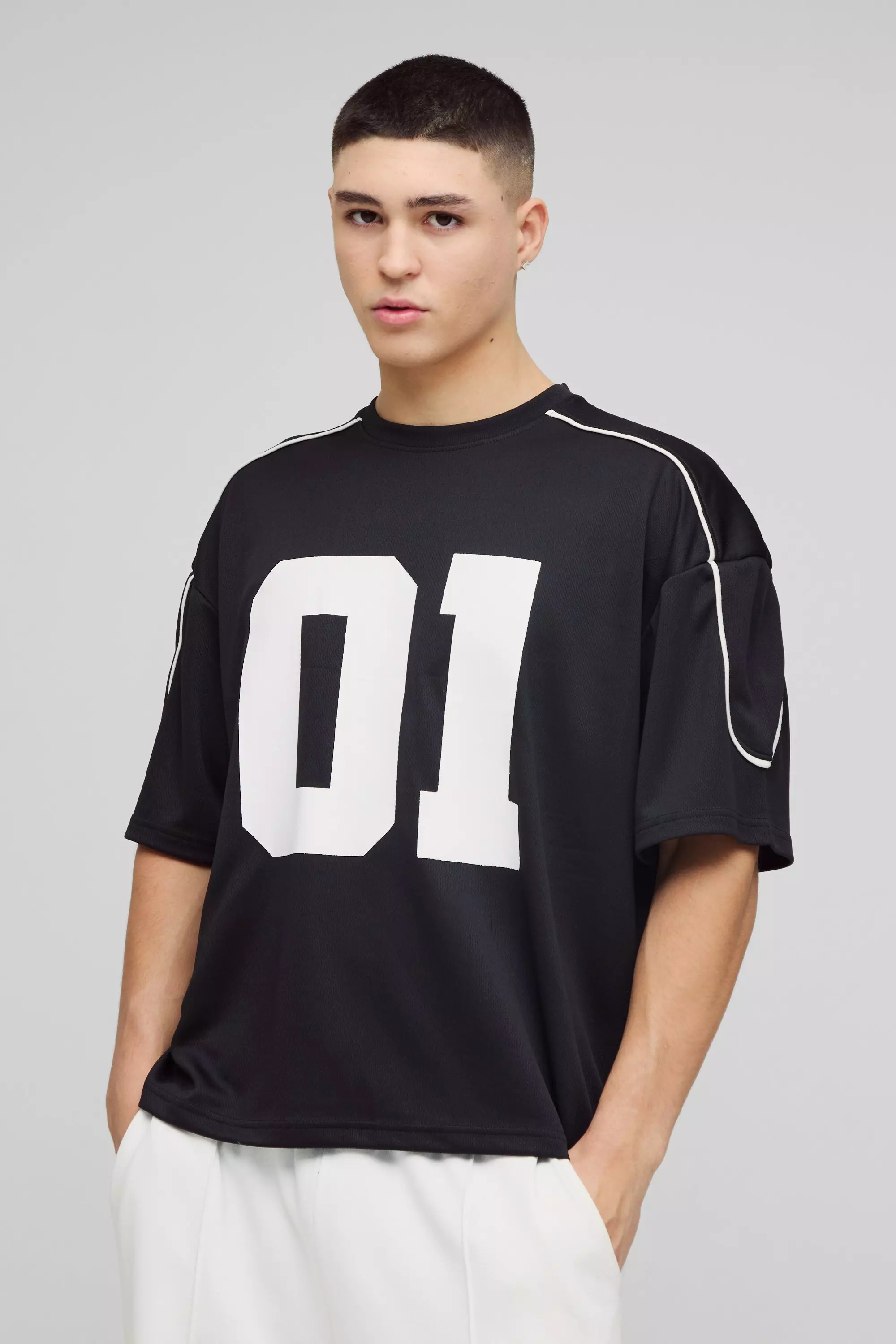 Black Oversized Boxy Half Sleeve Varsity T-Shirt