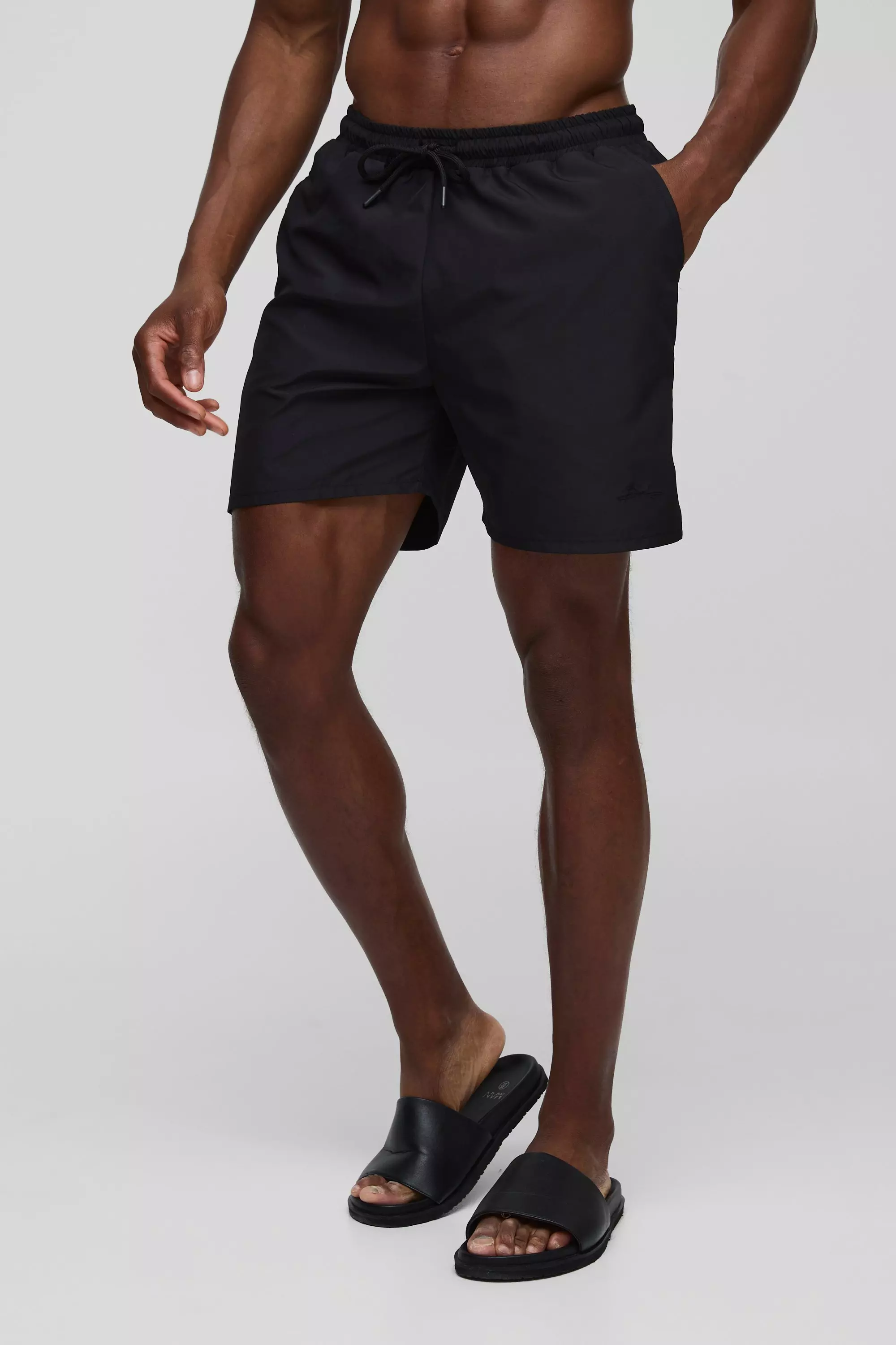 Black Branded Mid Length Swim Short in Black