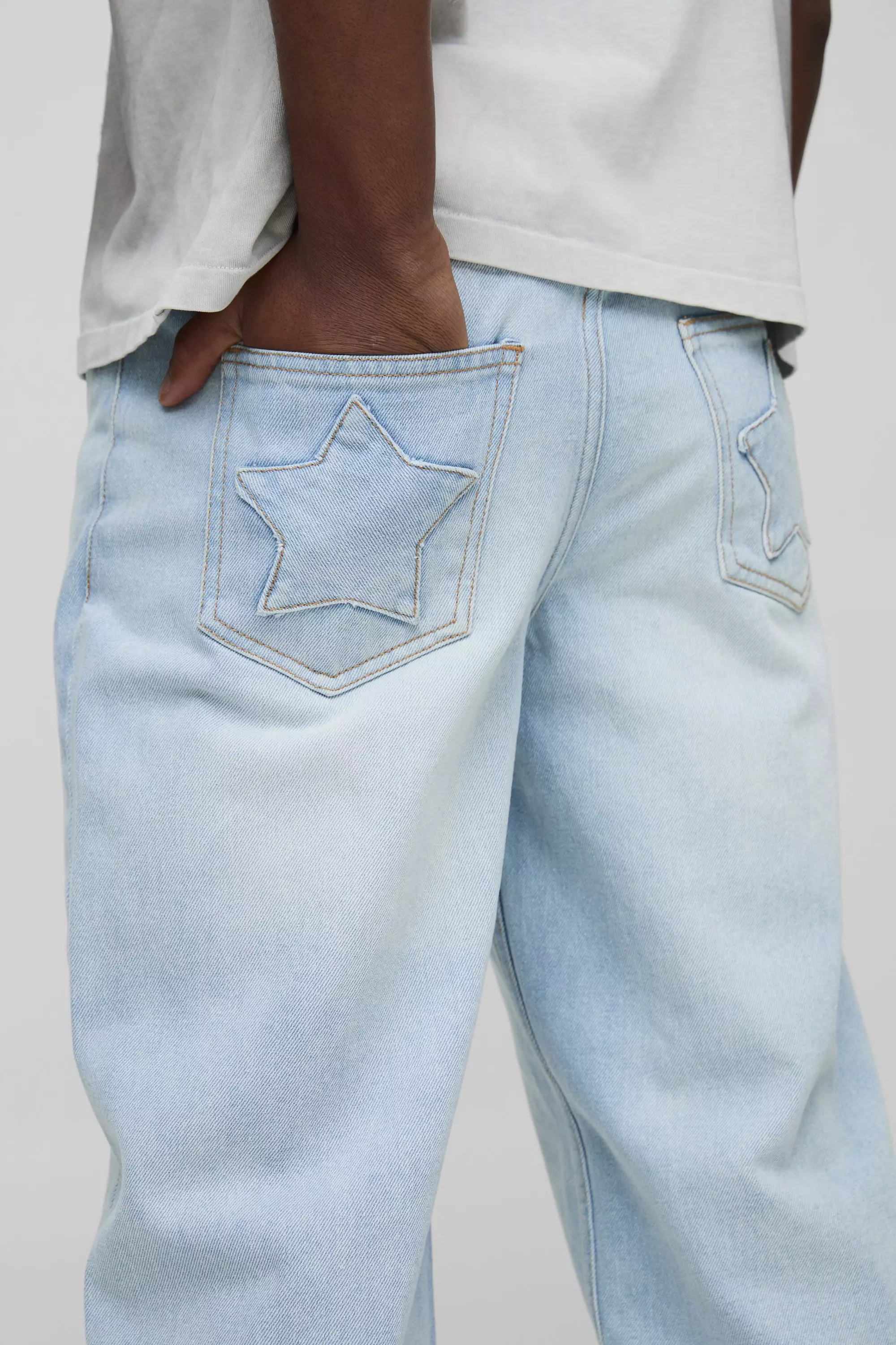 Embroidered Star Pocket Detail Relaxed Fit Jeans | boohooMAN UK