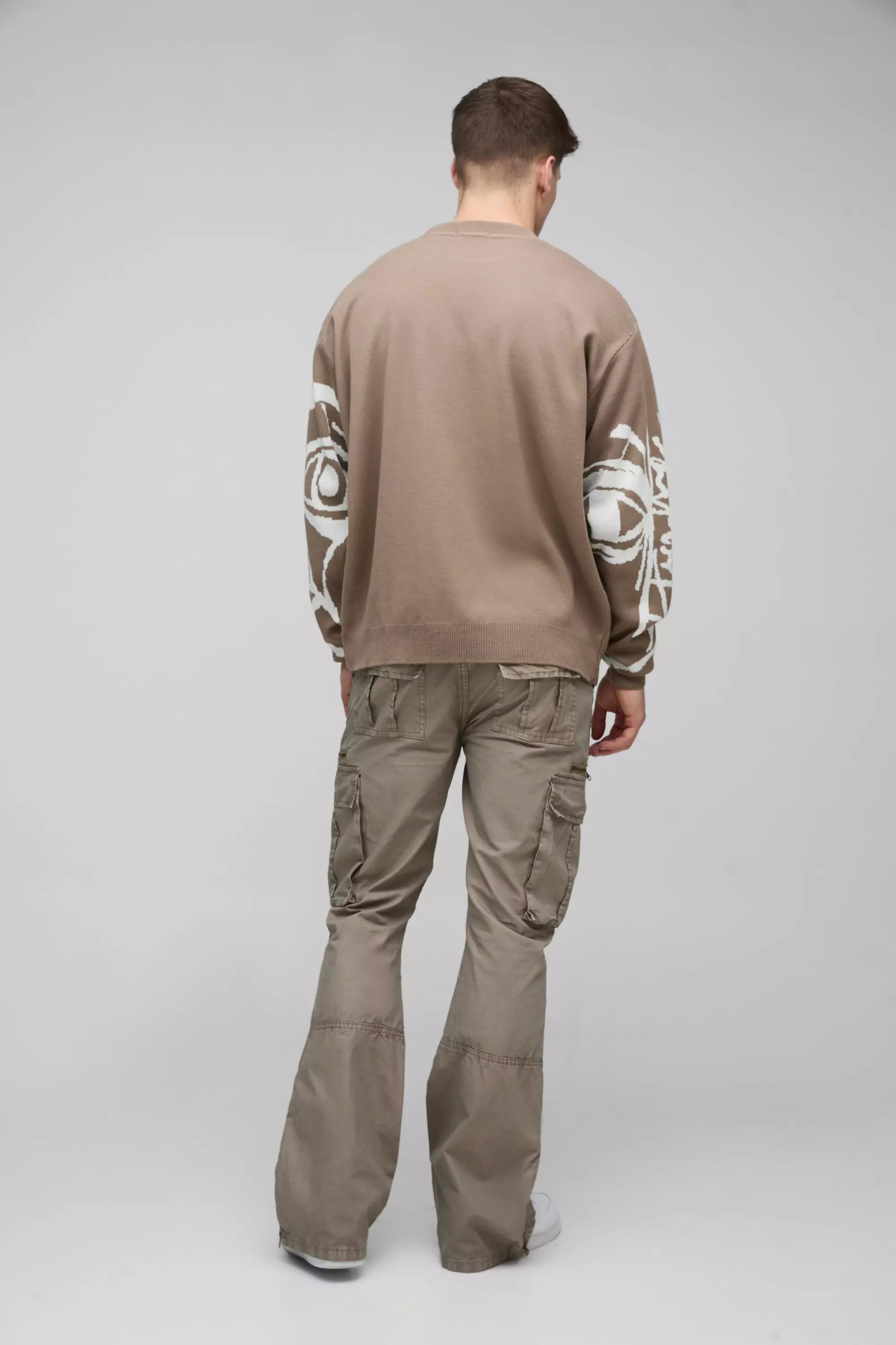 Tall Slim Flare Zip Gusset Overdye Acid Wash Cargo Pants In Black | boohooMAN USA