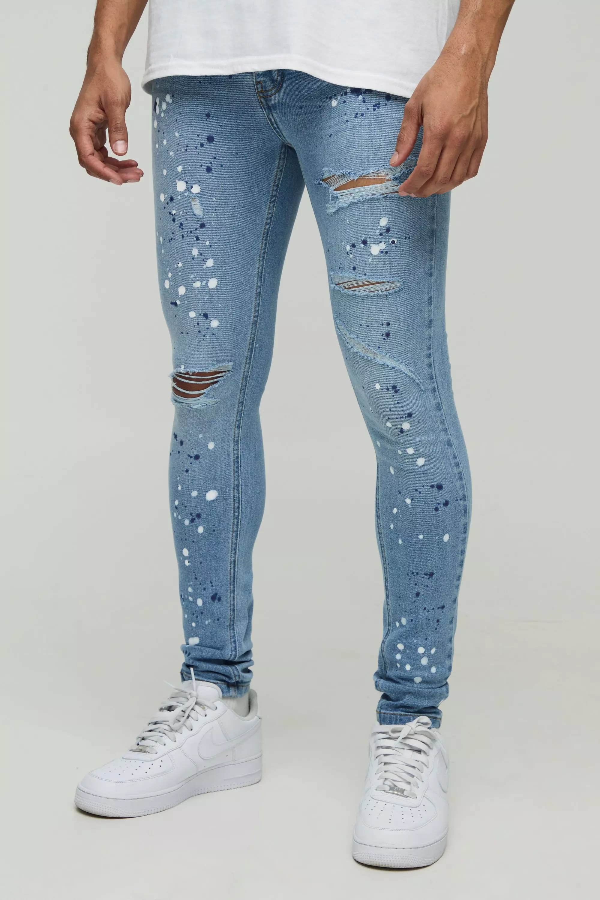 Super Skinny Rip & Repair Paint Splatter Denim Jeans | boohooMAN USA