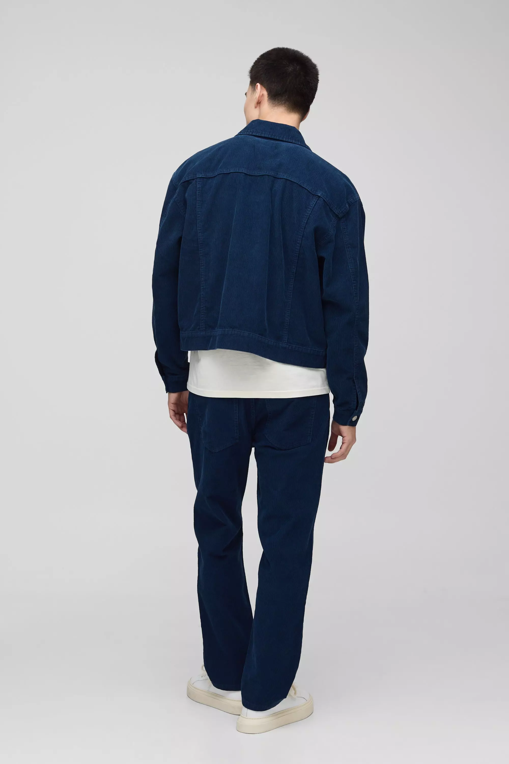 Tapered Navy Cord Trousers | boohooMAN USA