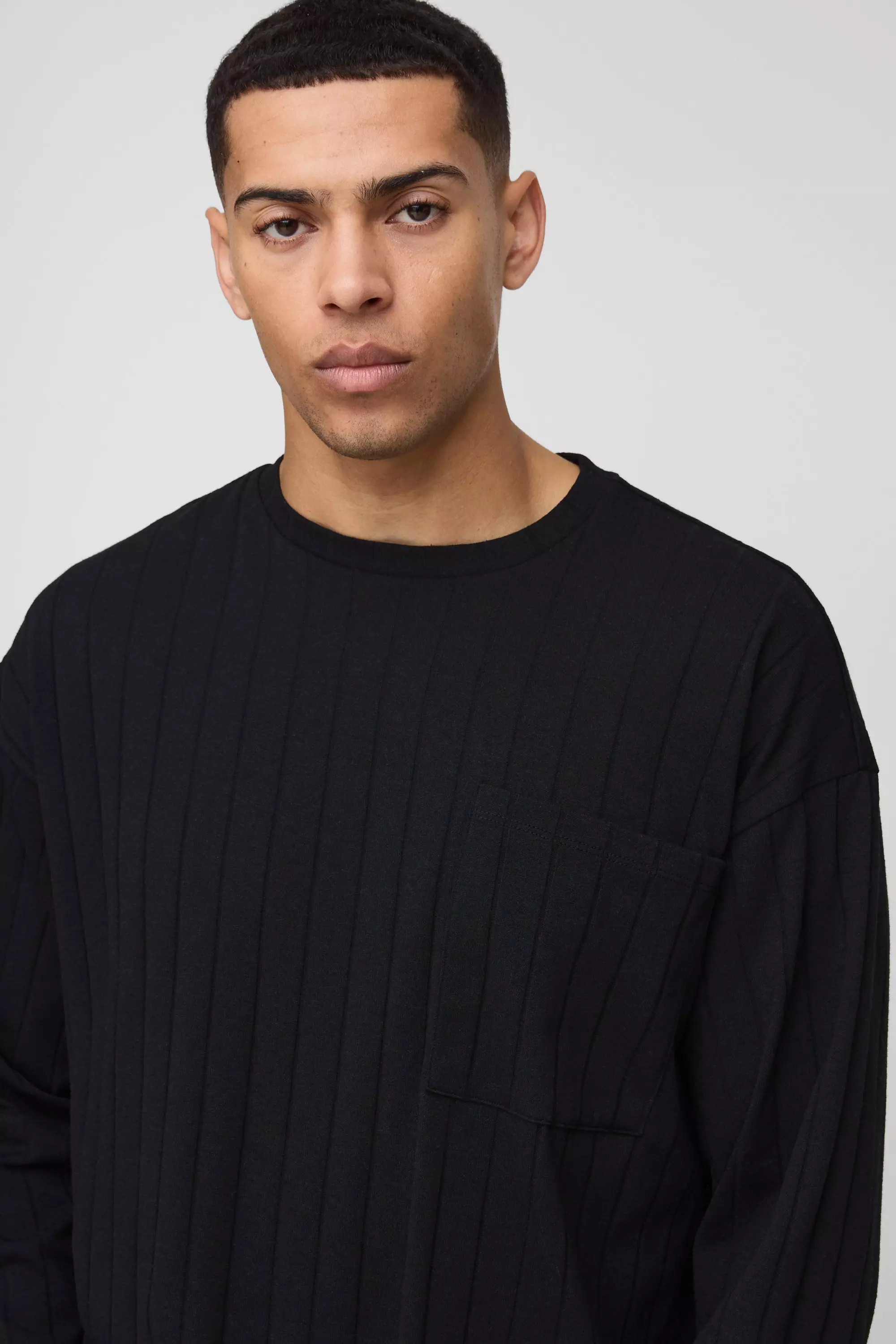 Langärmliges Oversize T-Shirt mit Taschen-Detail, Black alternatives Bild