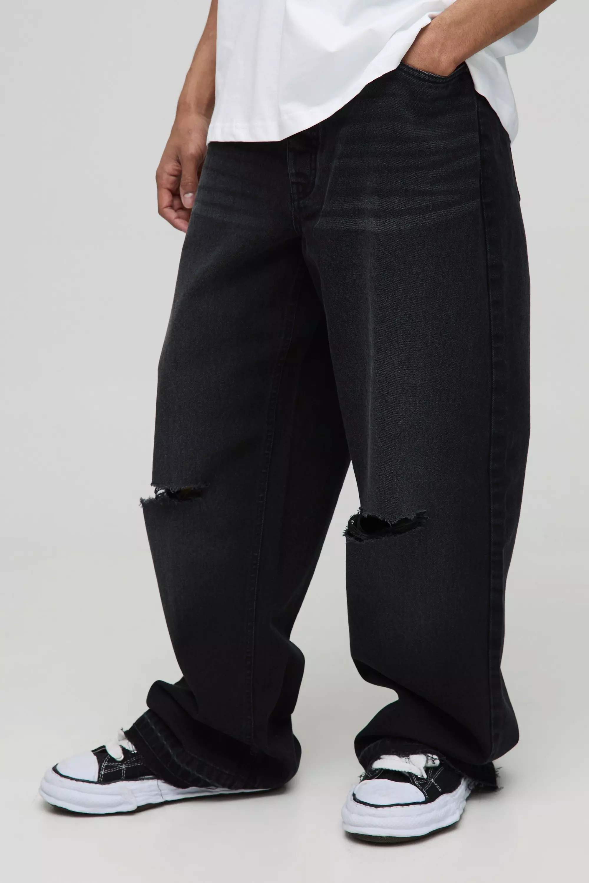 Wide Leg Ripped Knee Jeans With Let Down Hem Washed black