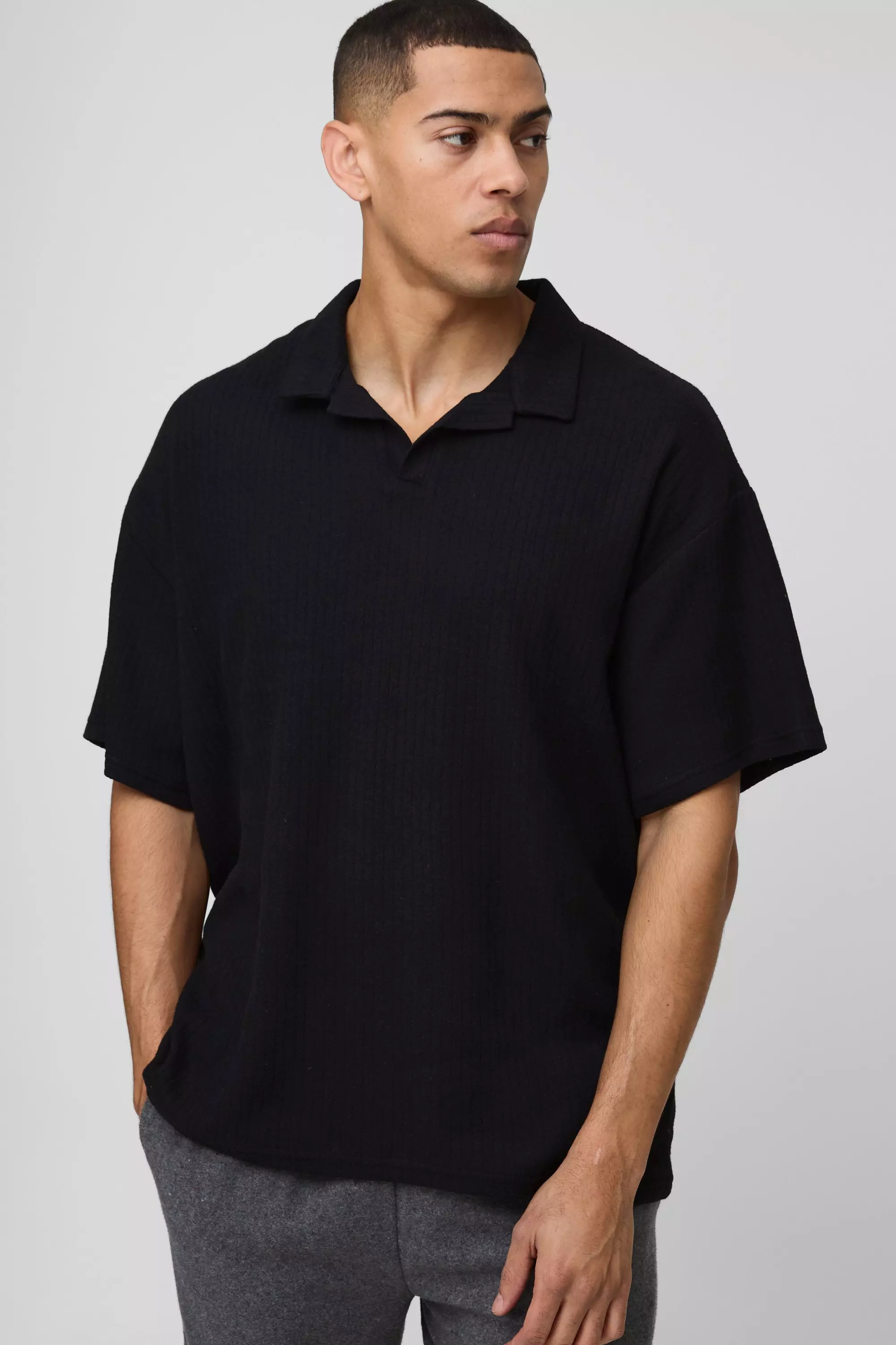 Black Oversized Polo Met Textuur En Revers Kraag alternatieve afbeelding