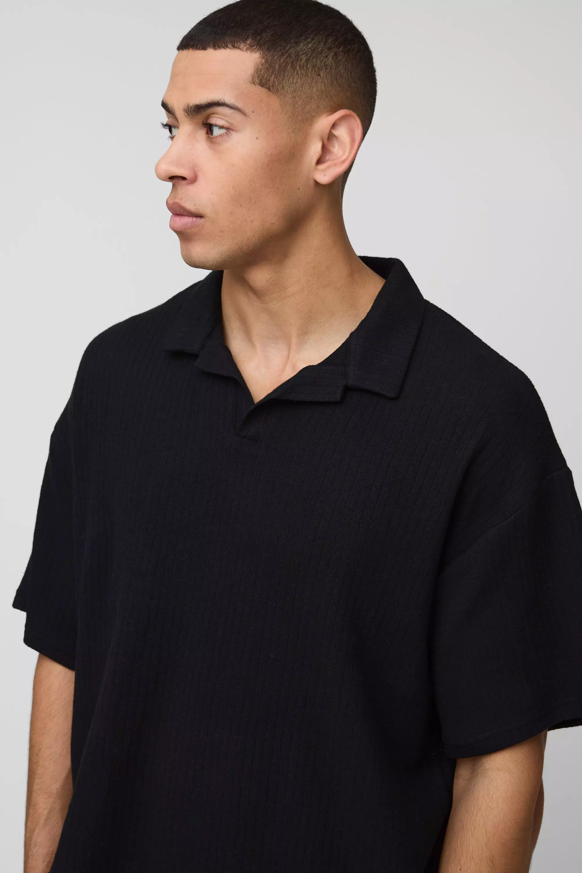 Black Oversized Polo Met Textuur En Revers Kraag alternatieve afbeelding