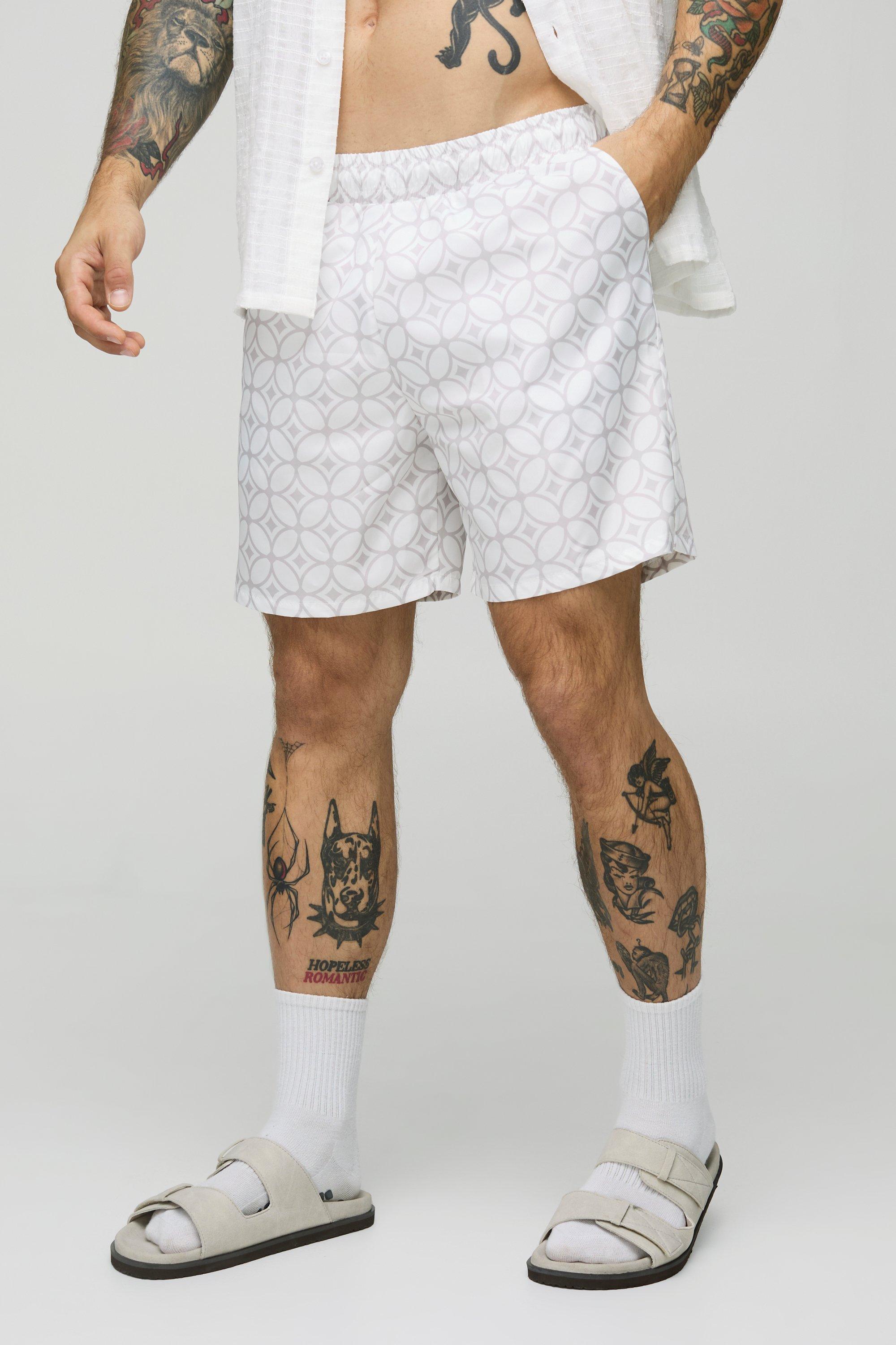 Abstract Pattern Mid Length Swim Trunks | boohooMAN USA